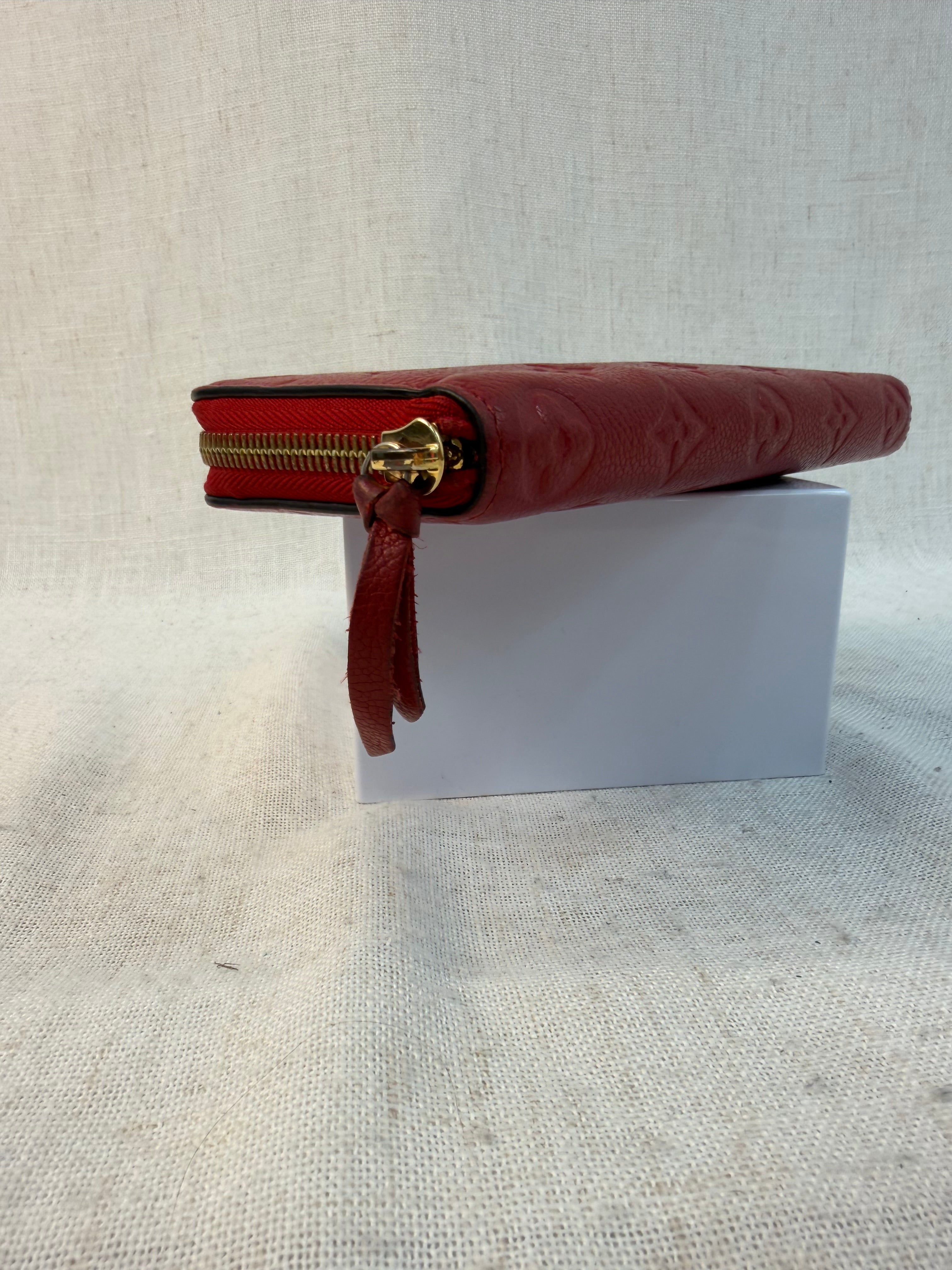 Louis Vuitton Empreinte Red Clemence Zippy Wallet