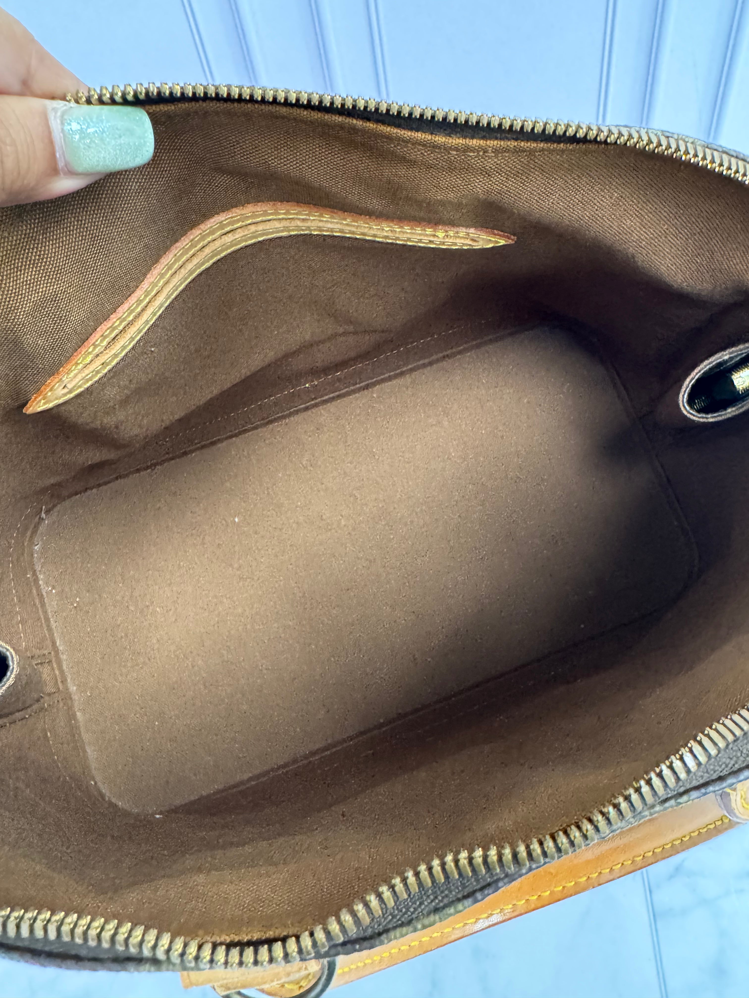 Louis Vuitton Monogram Alma PM Handbag