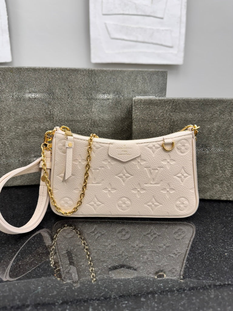 LIKE NEW - Louis Vuitton Creme Monogram Empreinte Easy Pouch On Strap