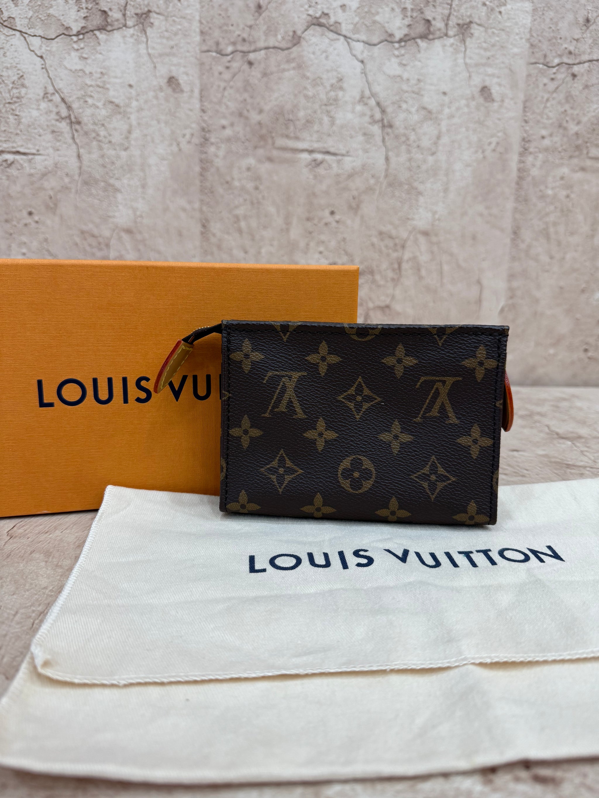 BRAND NEW Louis Vuitton Monogram Mini Toiletries Pouch