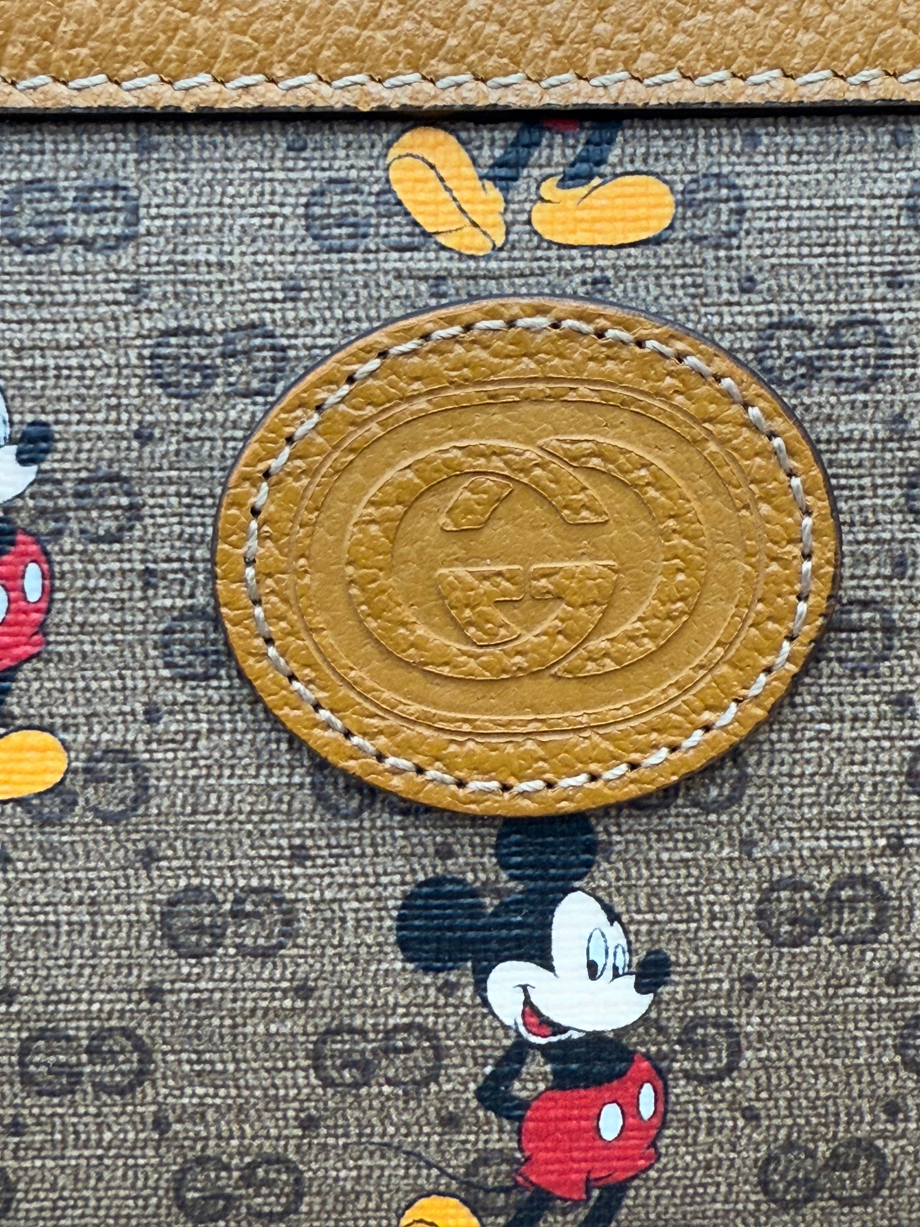 LIKE NEW Gucci x Disney Mickey Mouse GG Coated Canvas Pouch