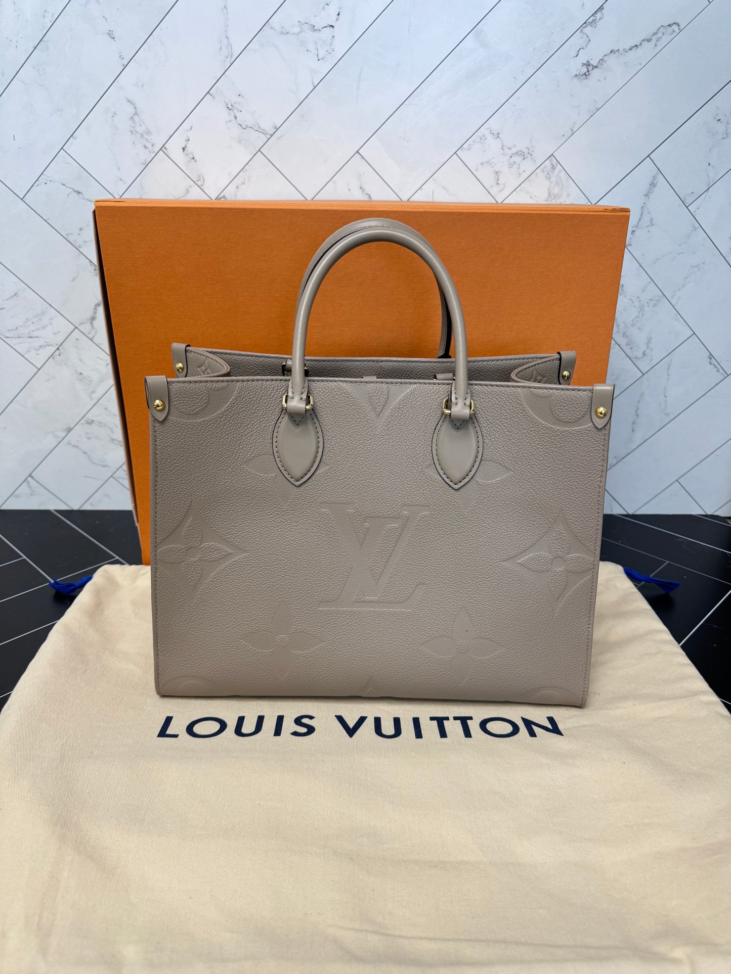 Louis Vuitton Turtledove Empreinte On the Go MM