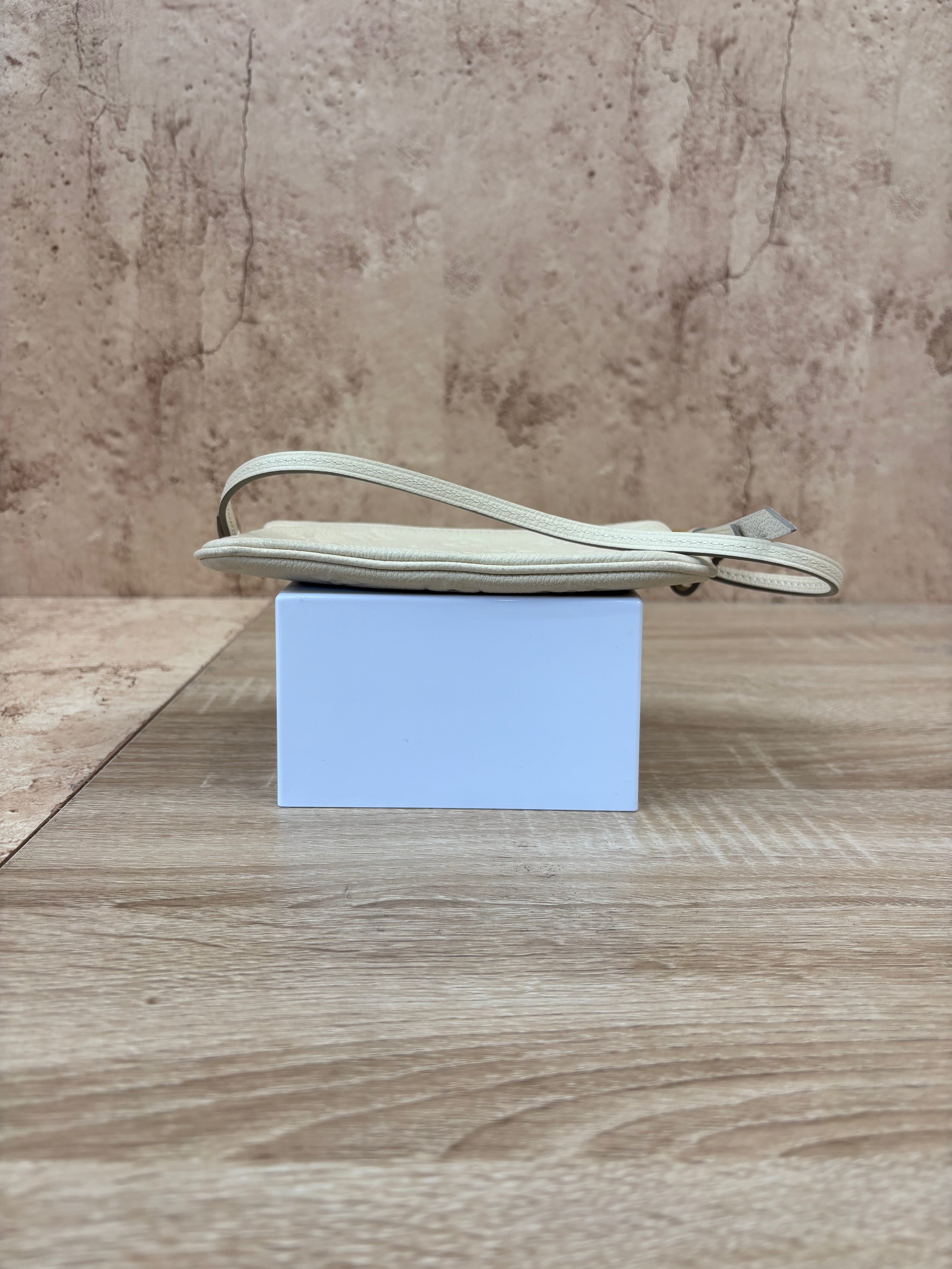 Louis Vuitton Cream Empreinte Leather Pochette