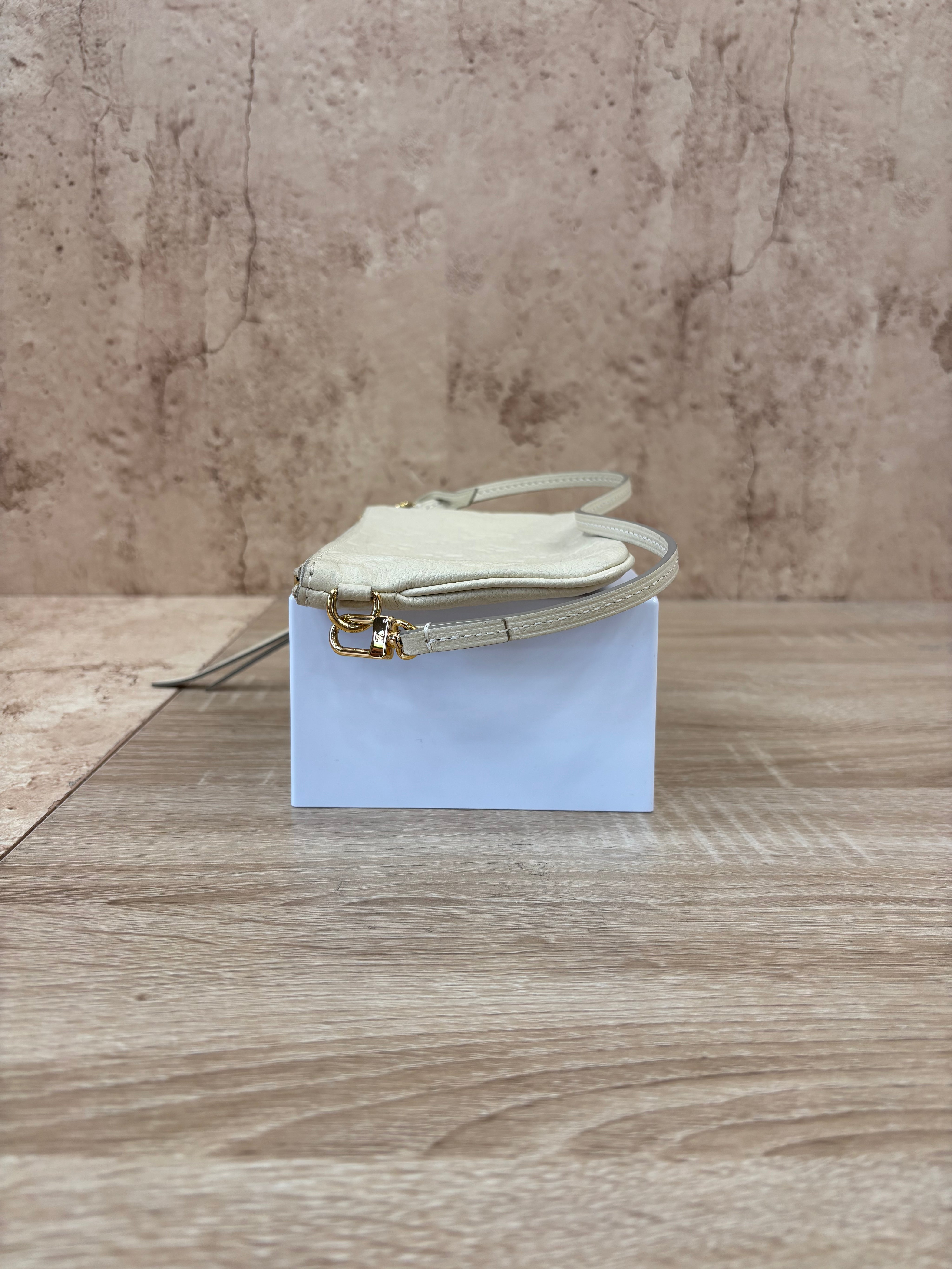 Louis Vuitton Cream Empreinte Leather Pochette