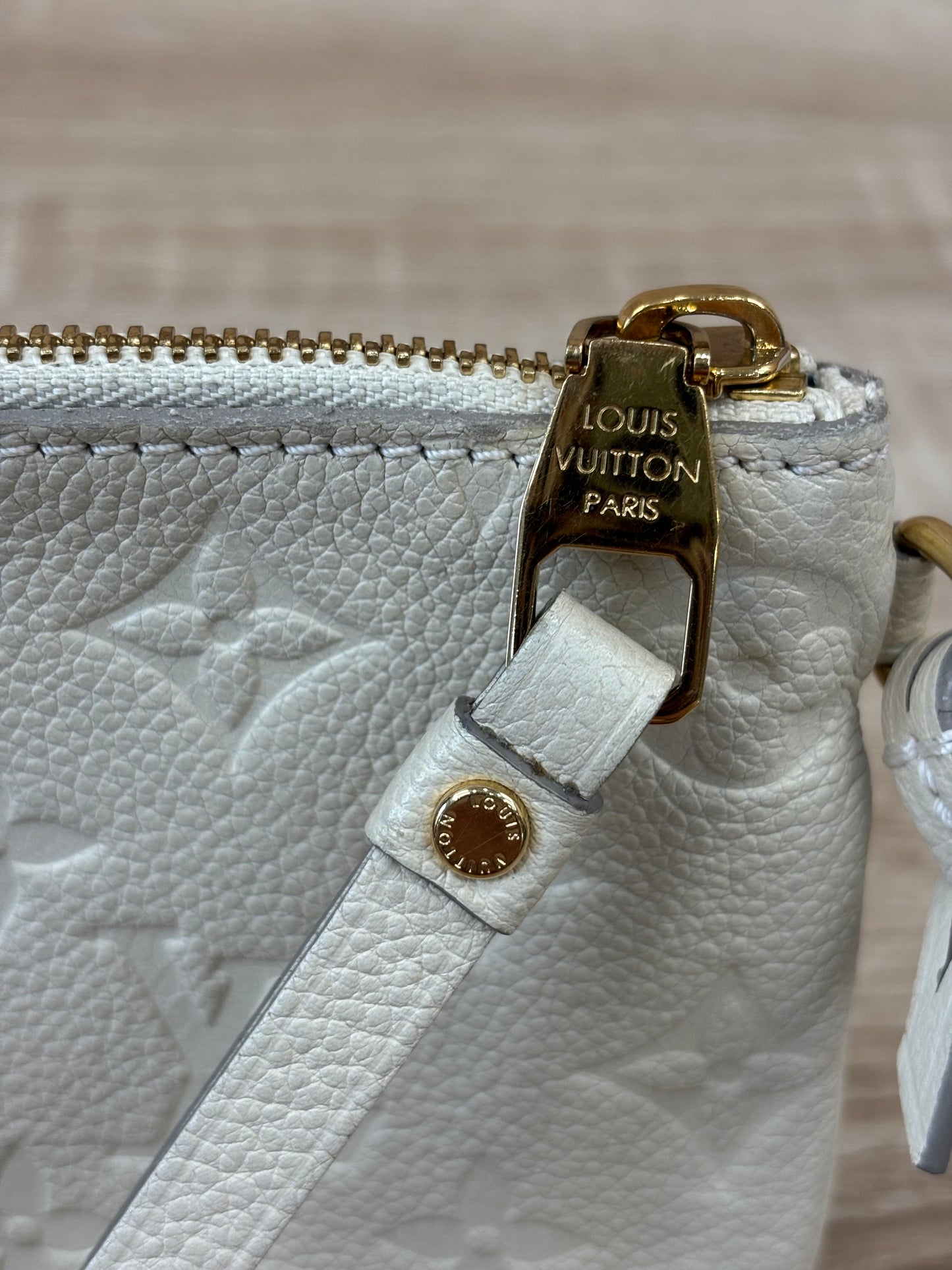Louis Vuitton Cream Empreinte Leather Pochette