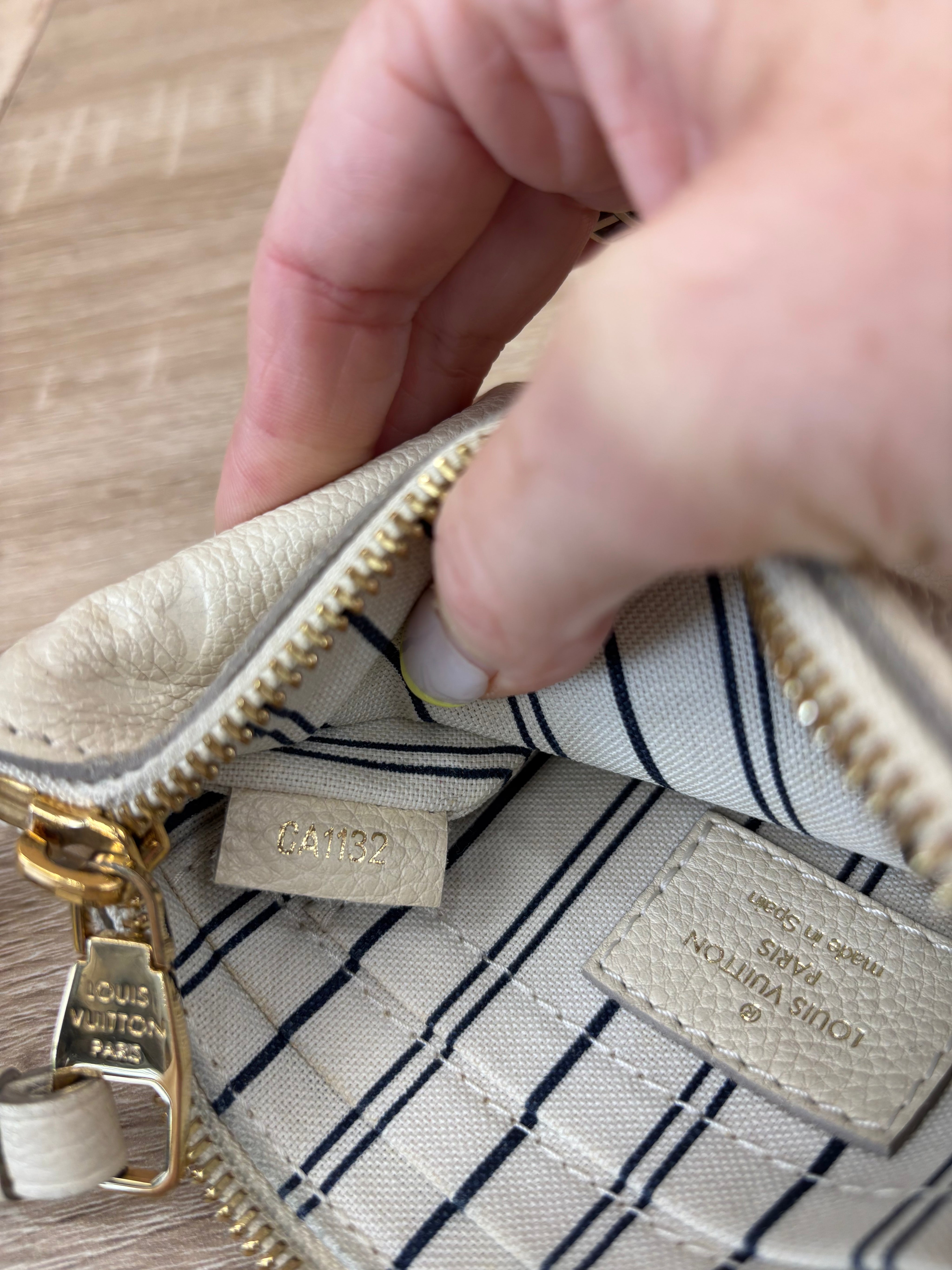 Louis Vuitton Cream Empreinte Leather Pochette
