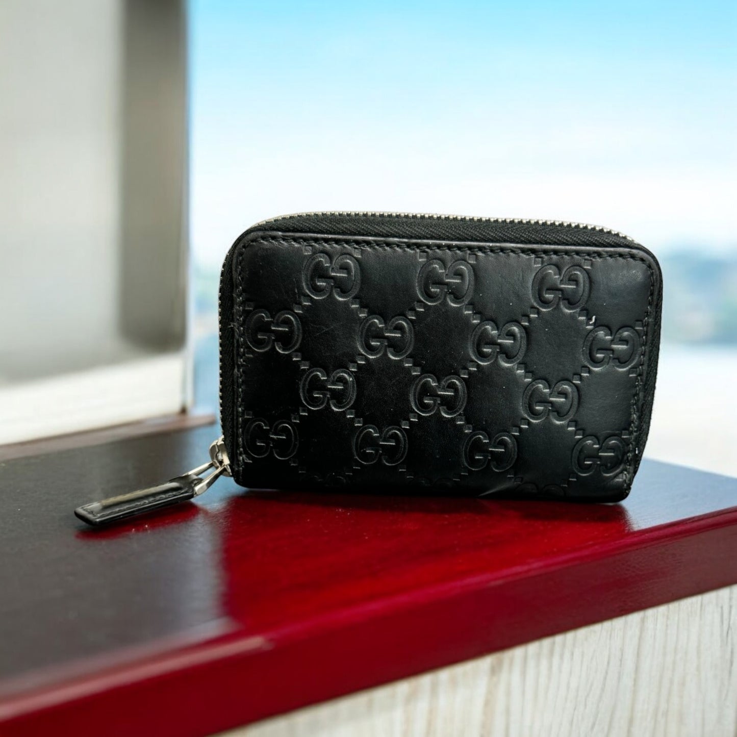 Gucci Black Guccissima Compact Zippy Wallet