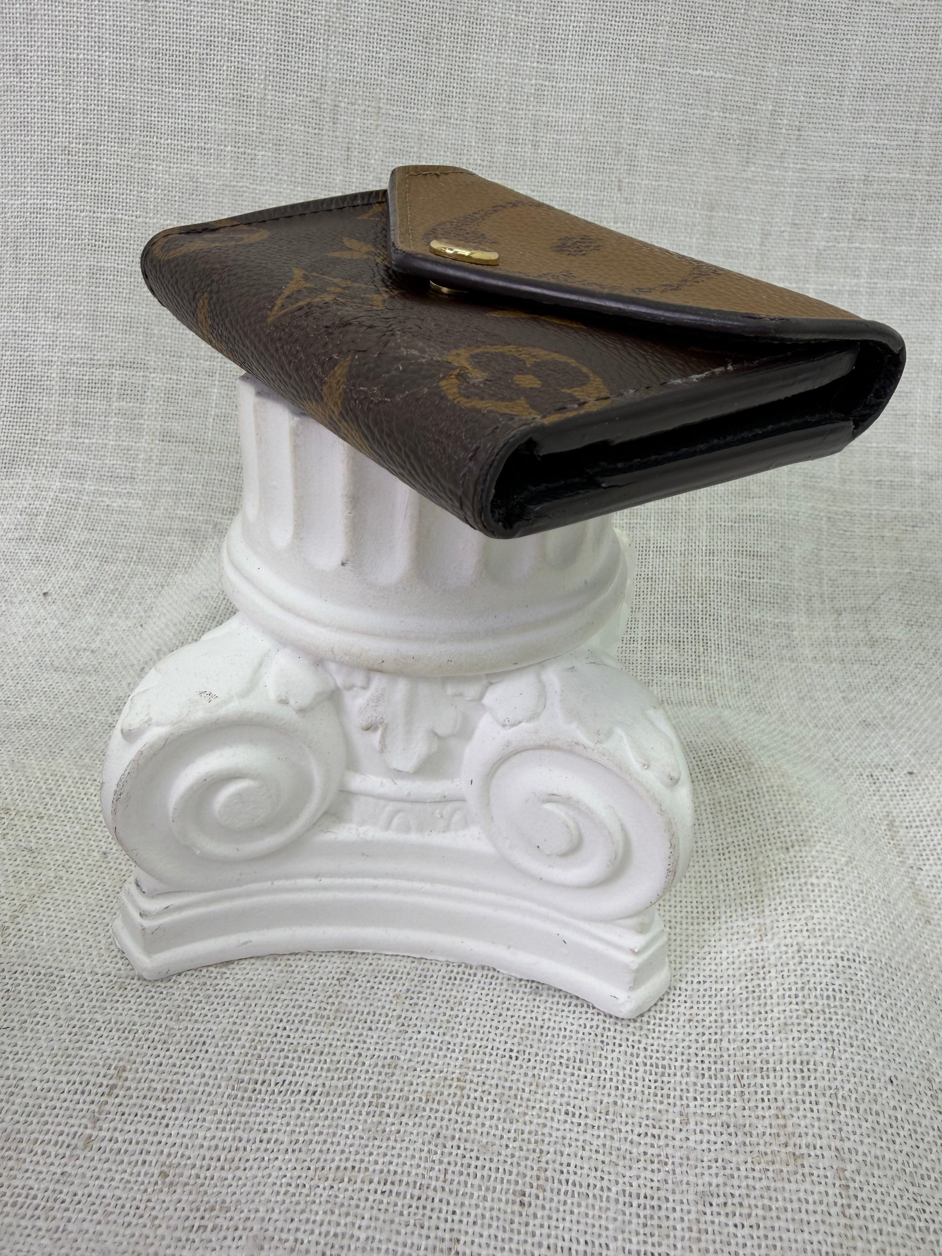 Louis Vuitton Reverse Monogram Zoe Compact Wallet