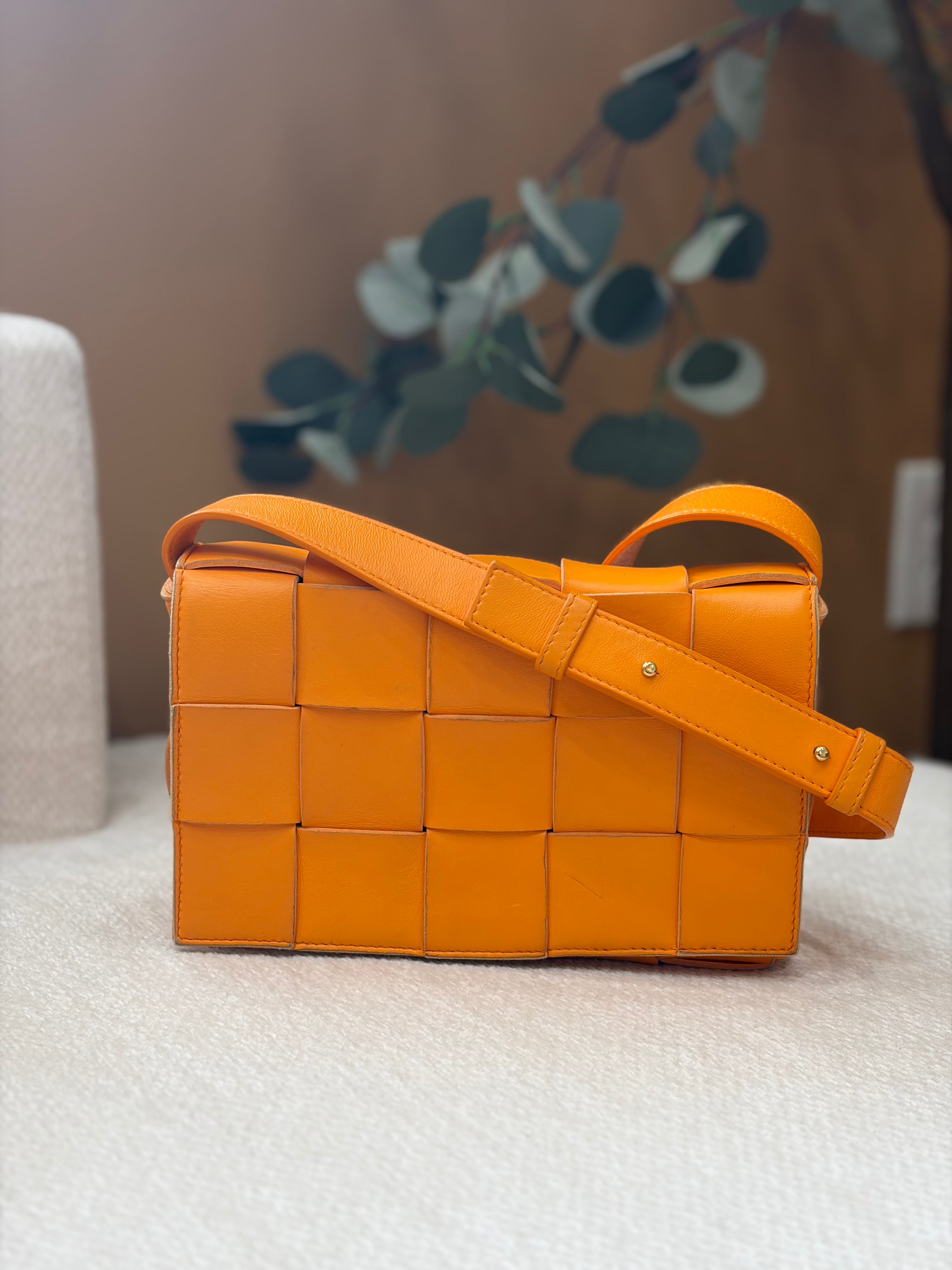 Bottega Veneta Orange Intrecciato Leather Cassette Crossbody Bag