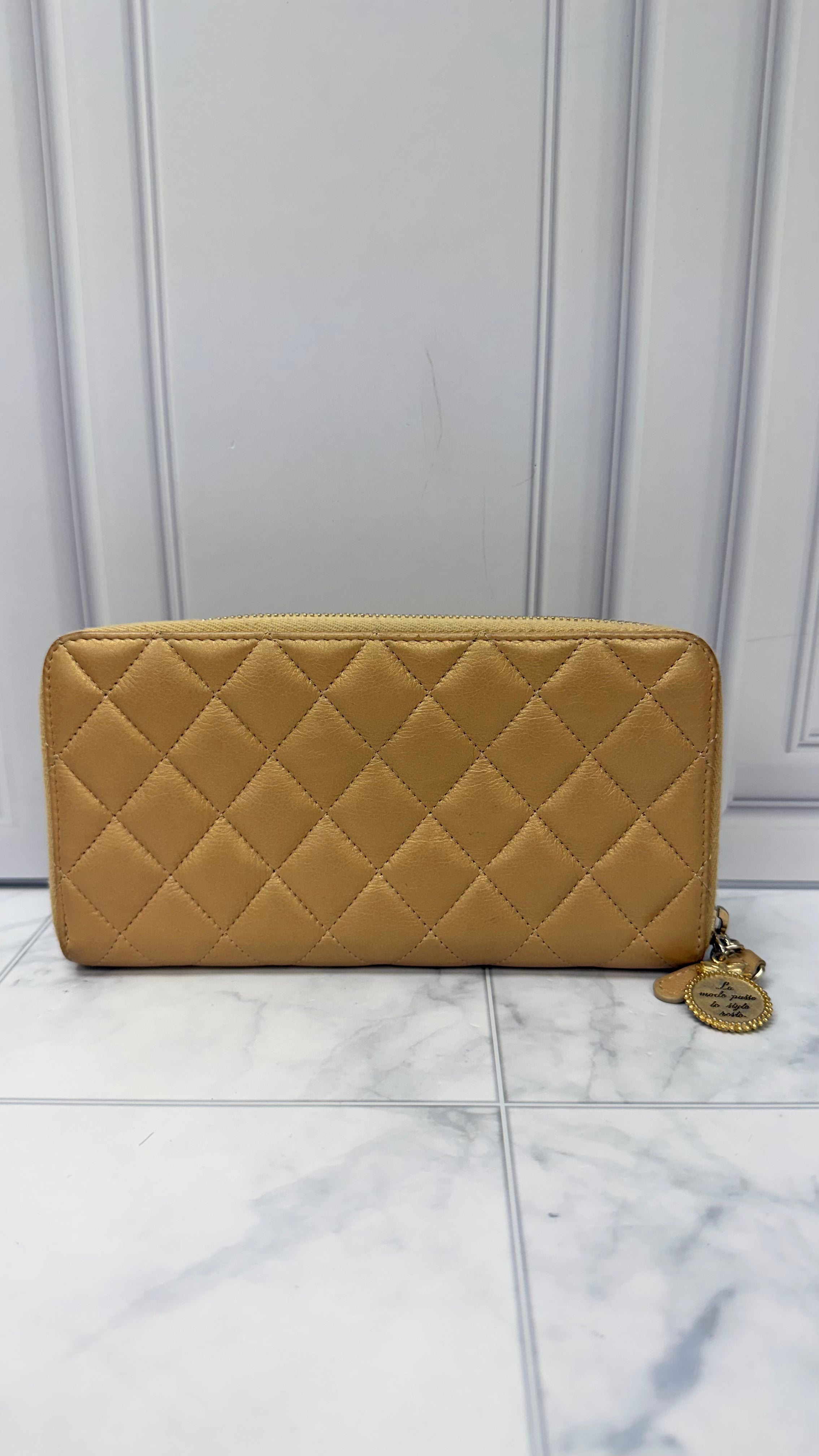 Chanel Gold Leather Zippy Wallet