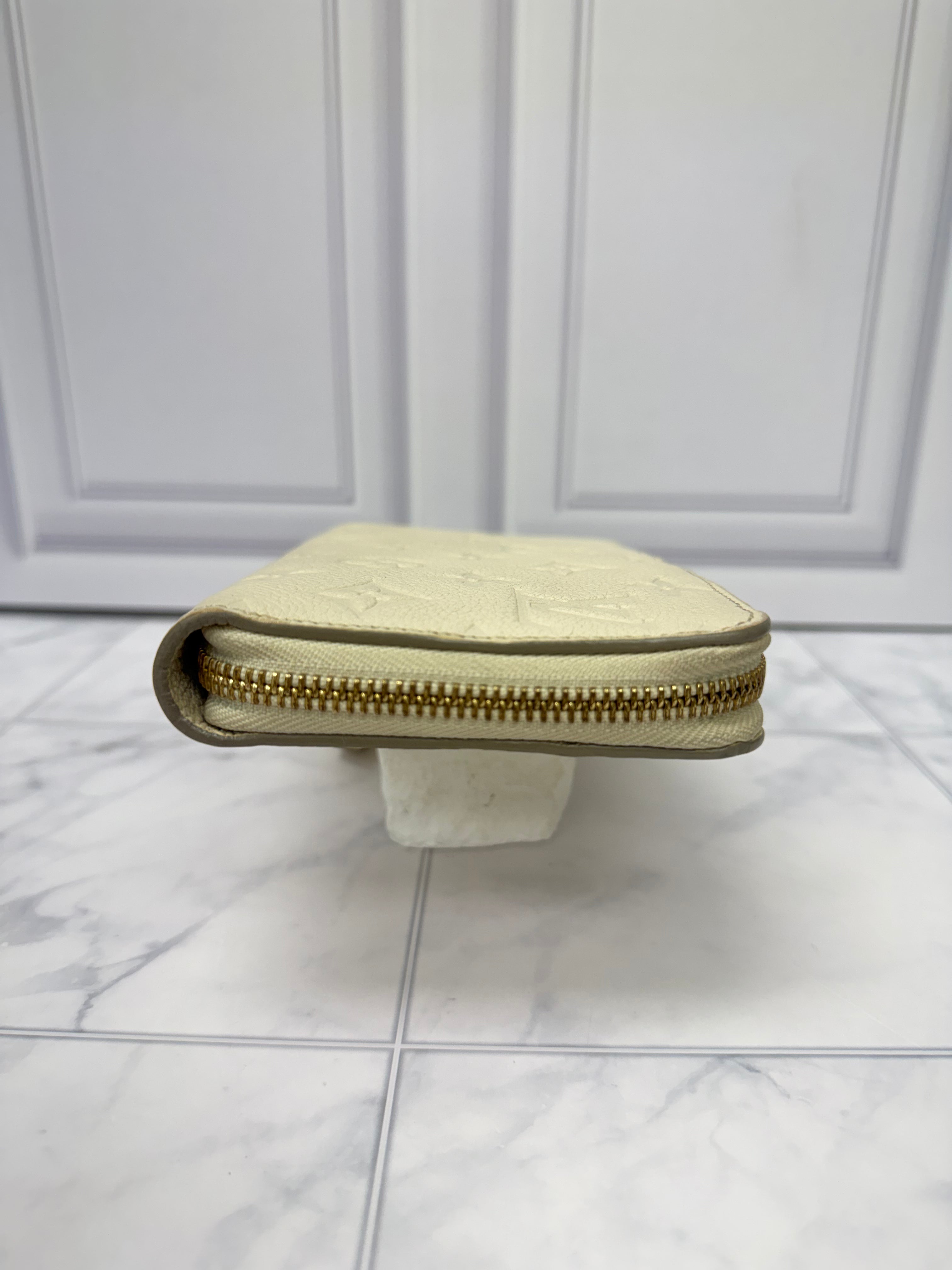 Louis Vuitton Cream Monogram Empreinte Leather Zippy Wallet