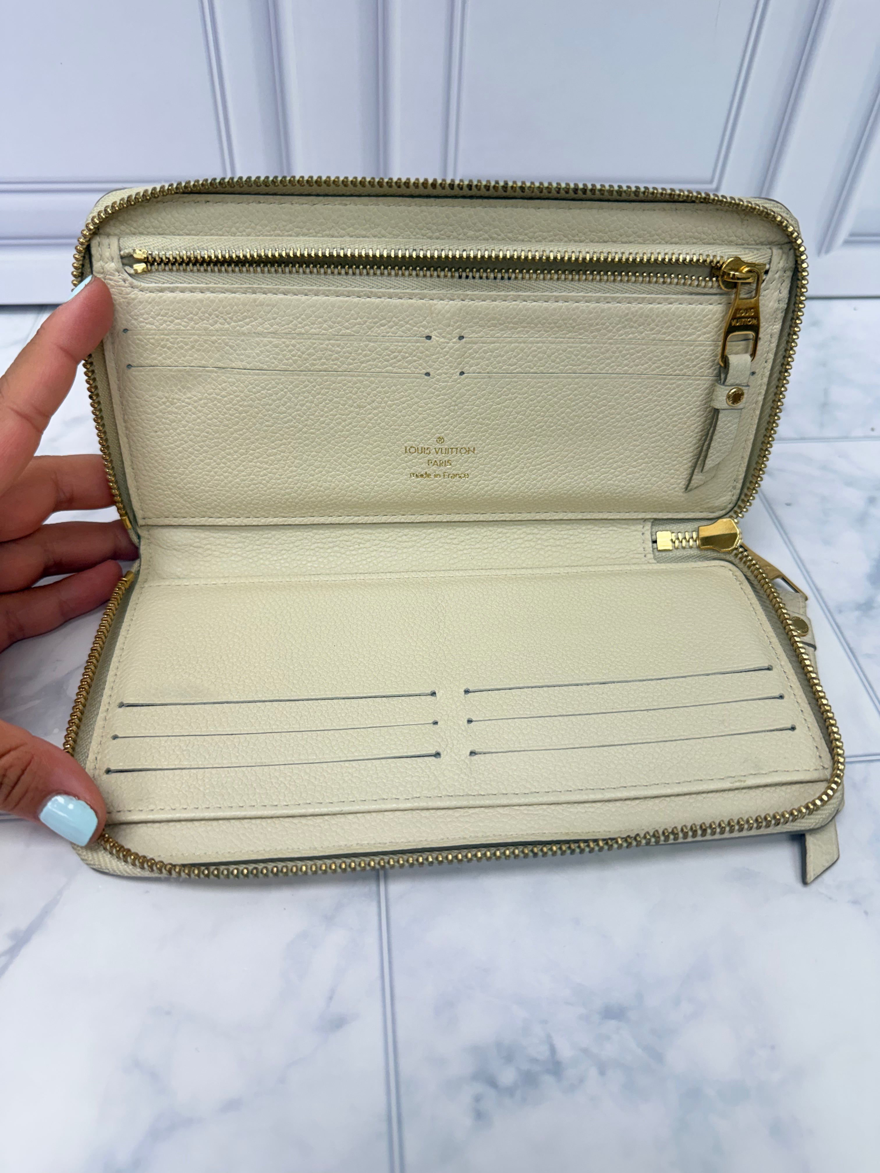 Louis Vuitton Cream Monogram Empreinte Leather Zippy Wallet