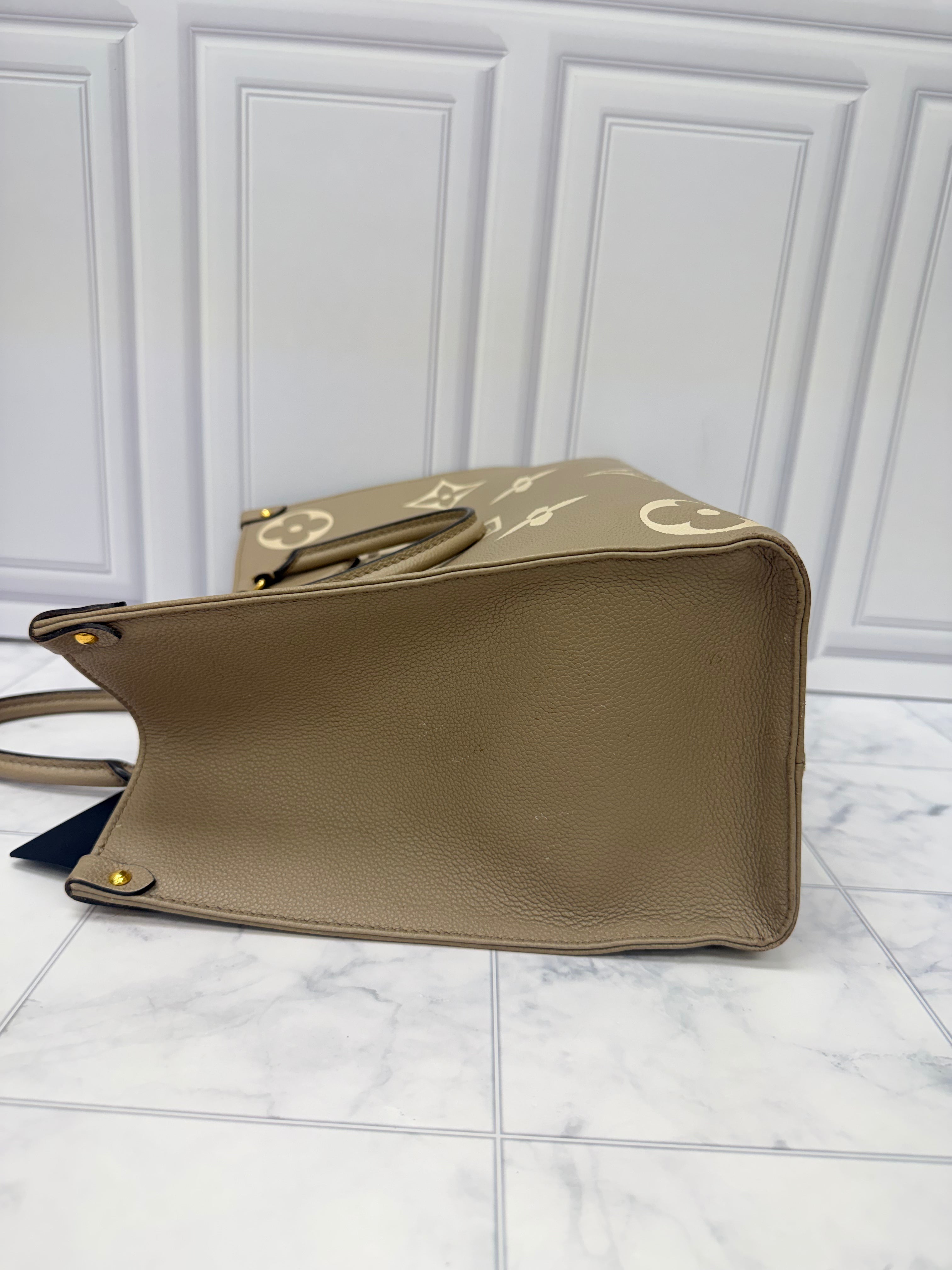Louis Vuitton Monogram Turtledove Empreinte Leather On The Go MM
