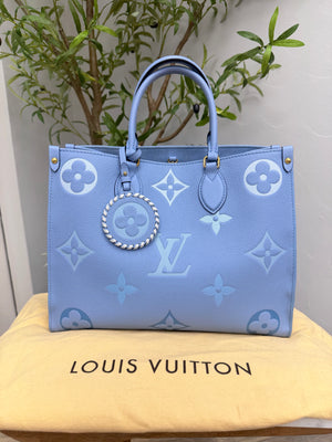 LIKE NEW - Louis Vuitton Blue Empreinte Leather By The Pool On The Go MM