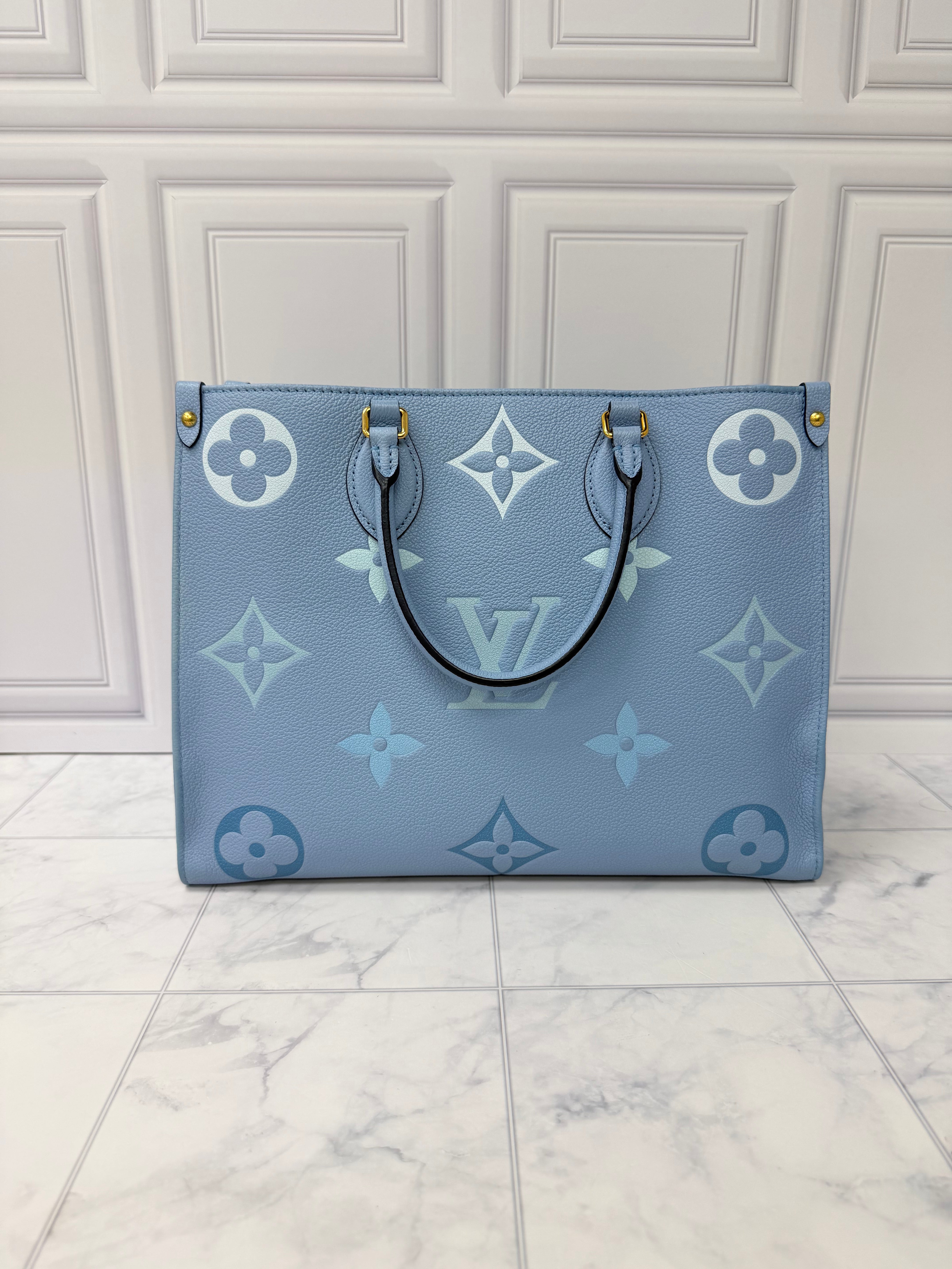LIKE NEW - Louis Vuitton Blue Empreinte Leather By The Pool On The Go MM