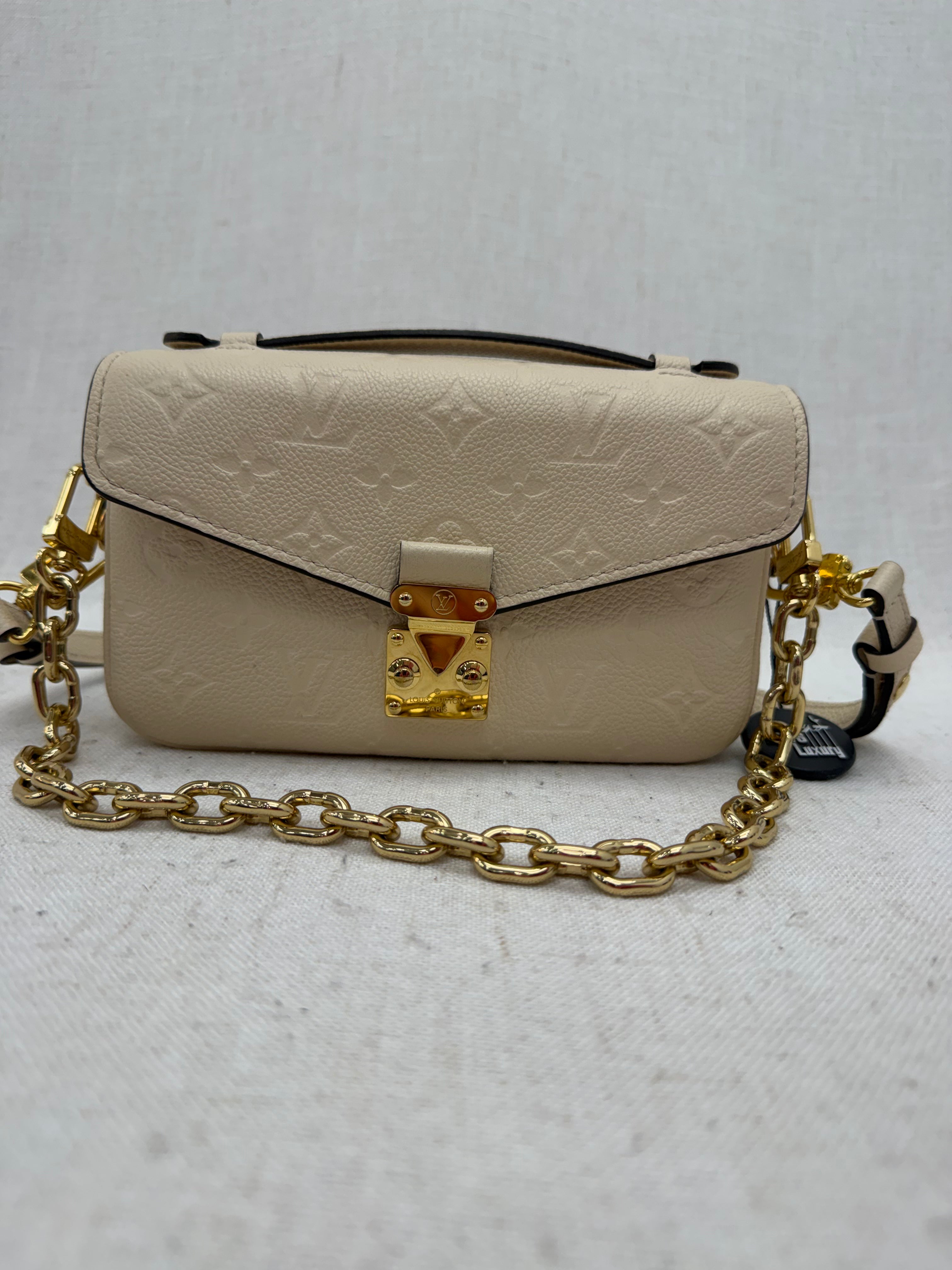 Louis Vuitton Cream Empreinte Leather East West Pochette Metis