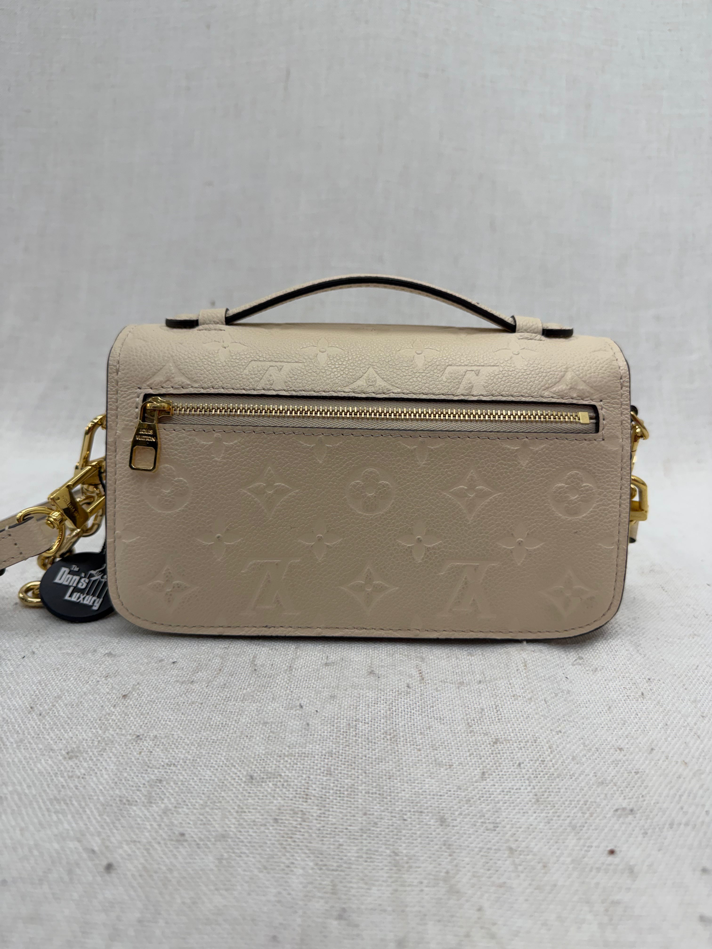 Louis Vuitton Cream Empreinte Leather East West Pochette Metis