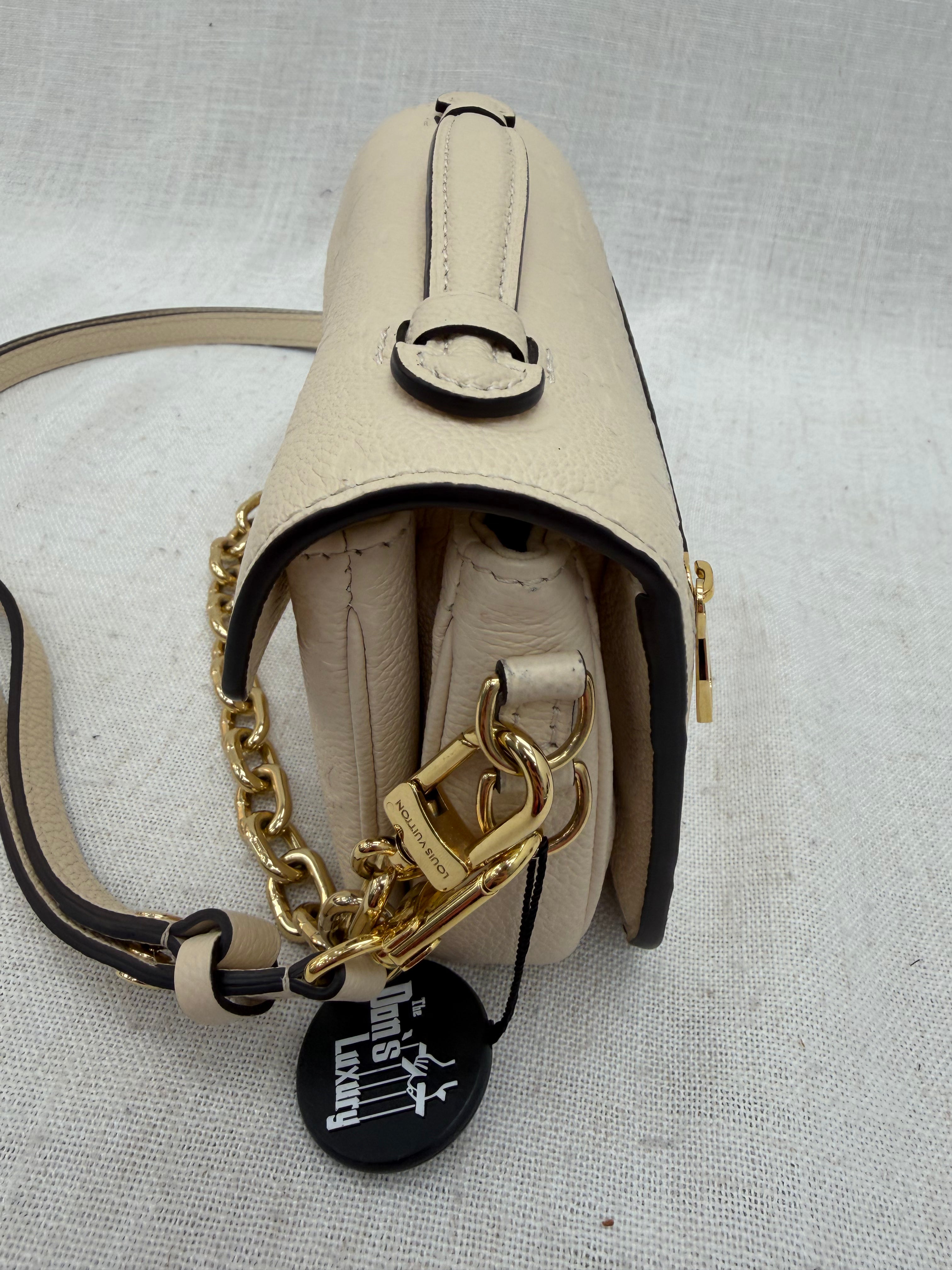 Louis Vuitton Cream Empreinte Leather East West Pochette Metis