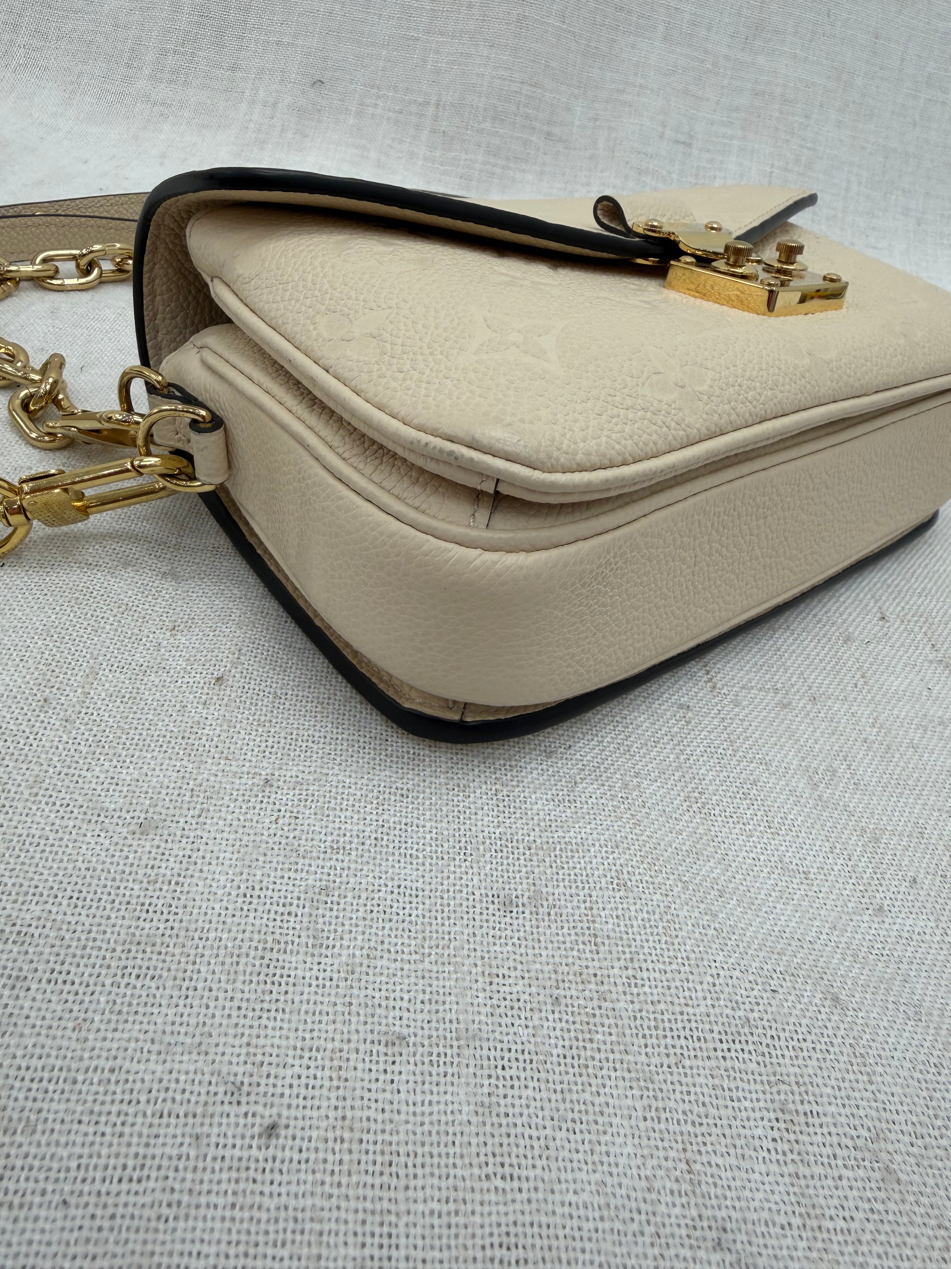 Louis Vuitton Cream Empreinte Leather East West Pochette Metis