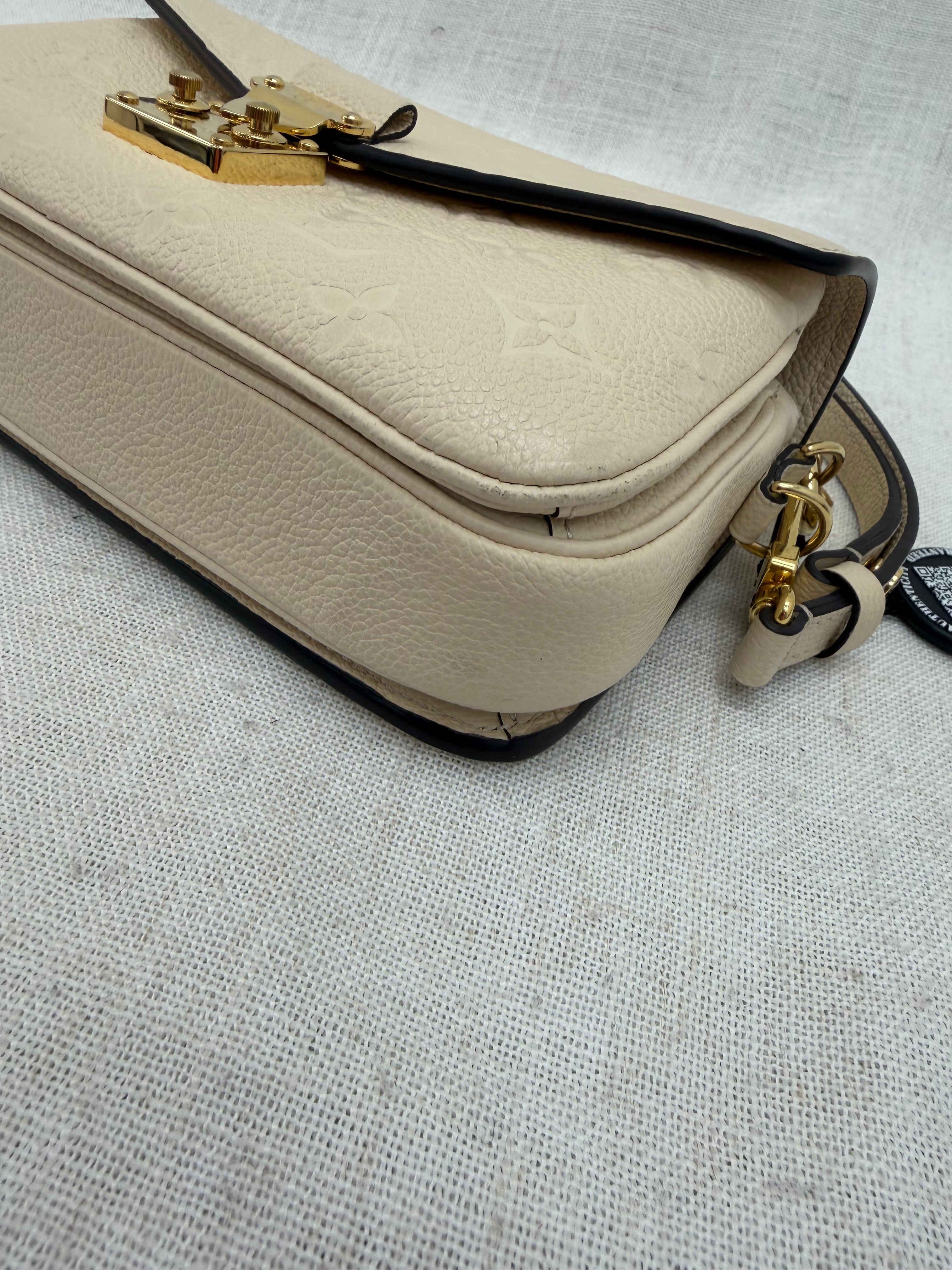 Louis Vuitton Cream Empreinte Leather East West Pochette Metis
