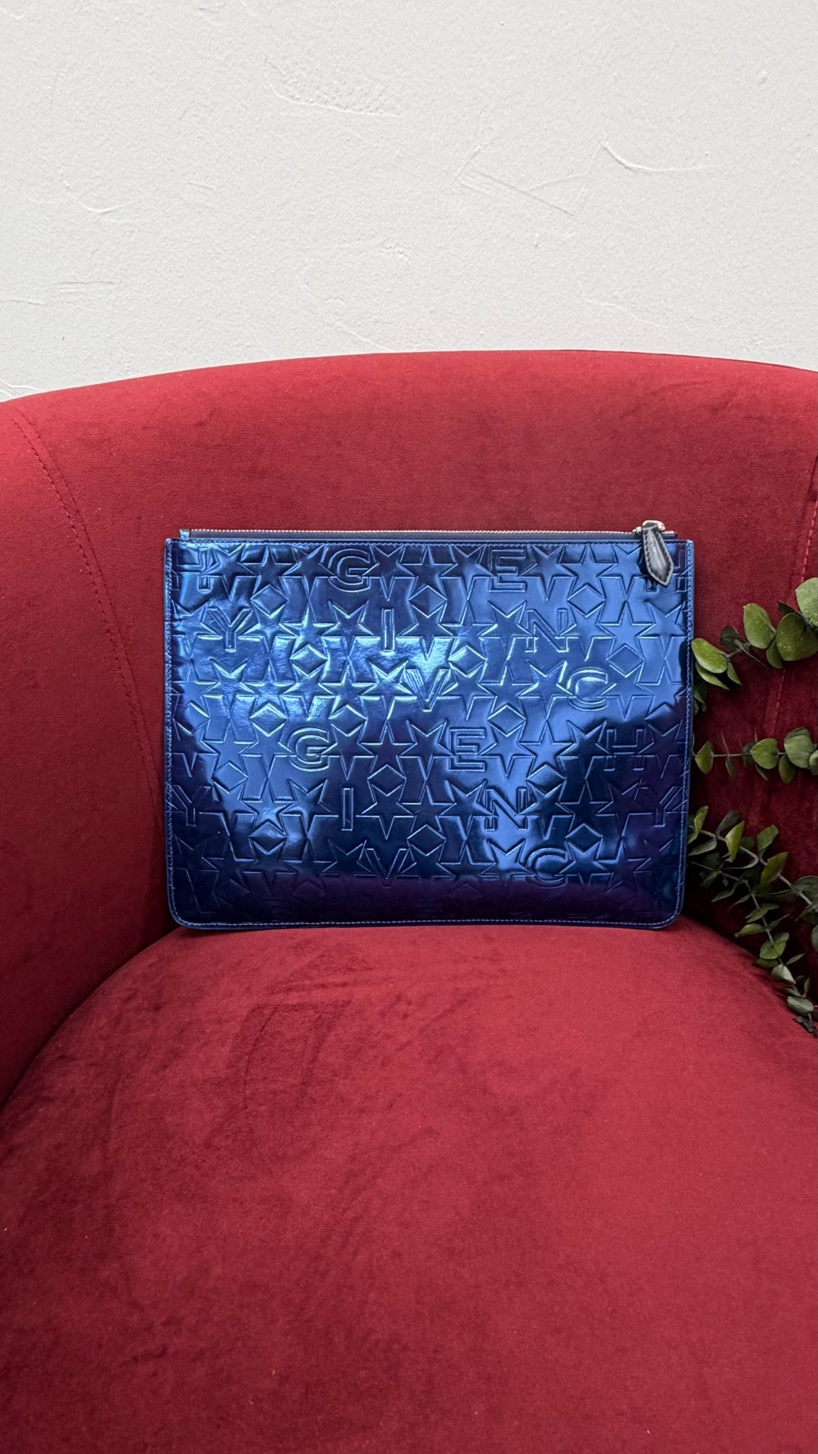 Givenchy Blue Star Embossed Zipper Clutch