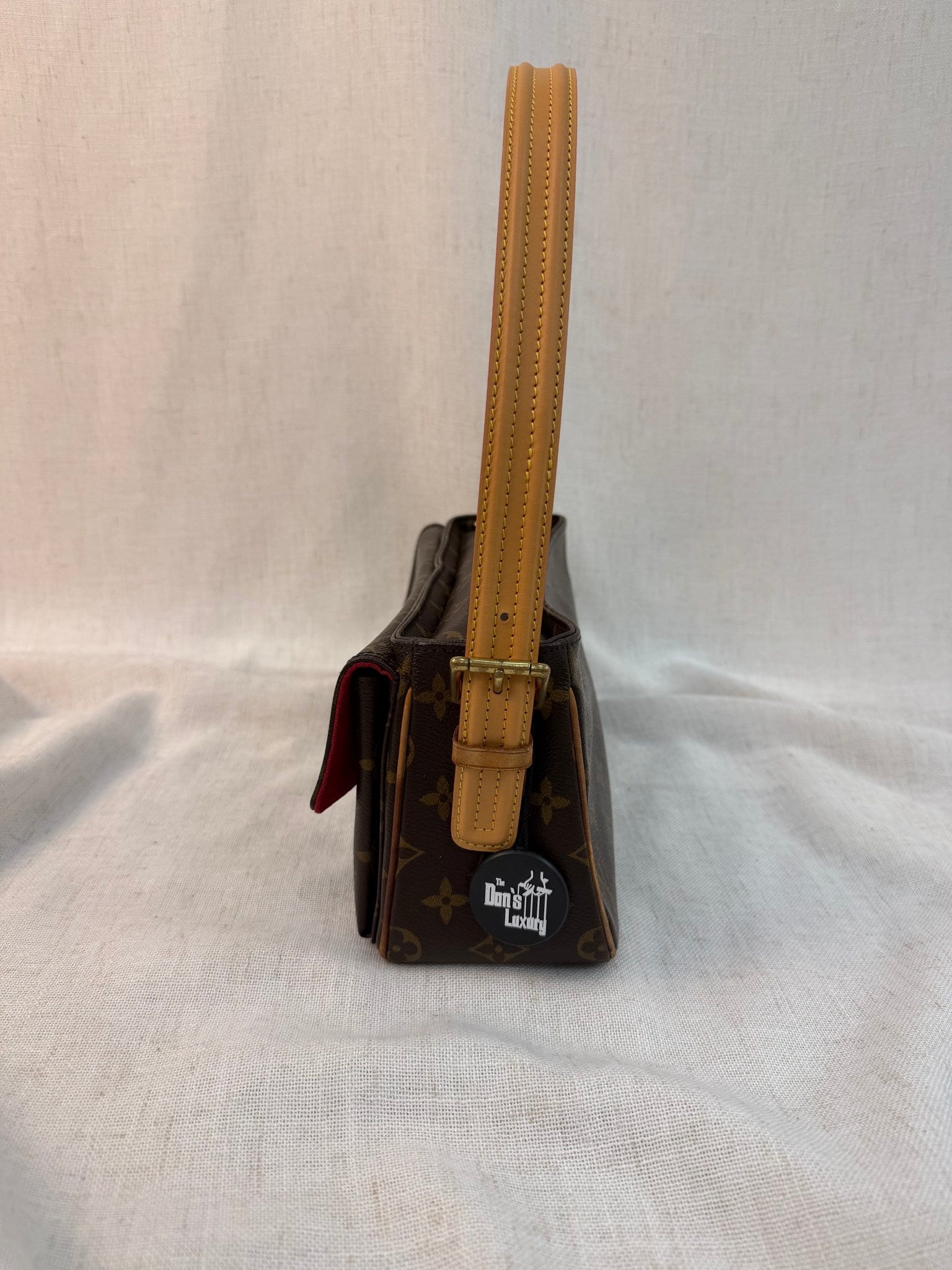 Louis Vuitton Monogram Viva Cite PM Handbag