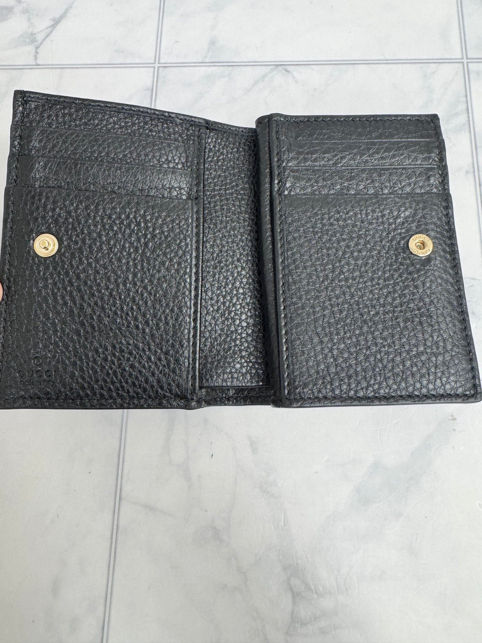 Gucci Black GG Embossed Leather Compact Wallet