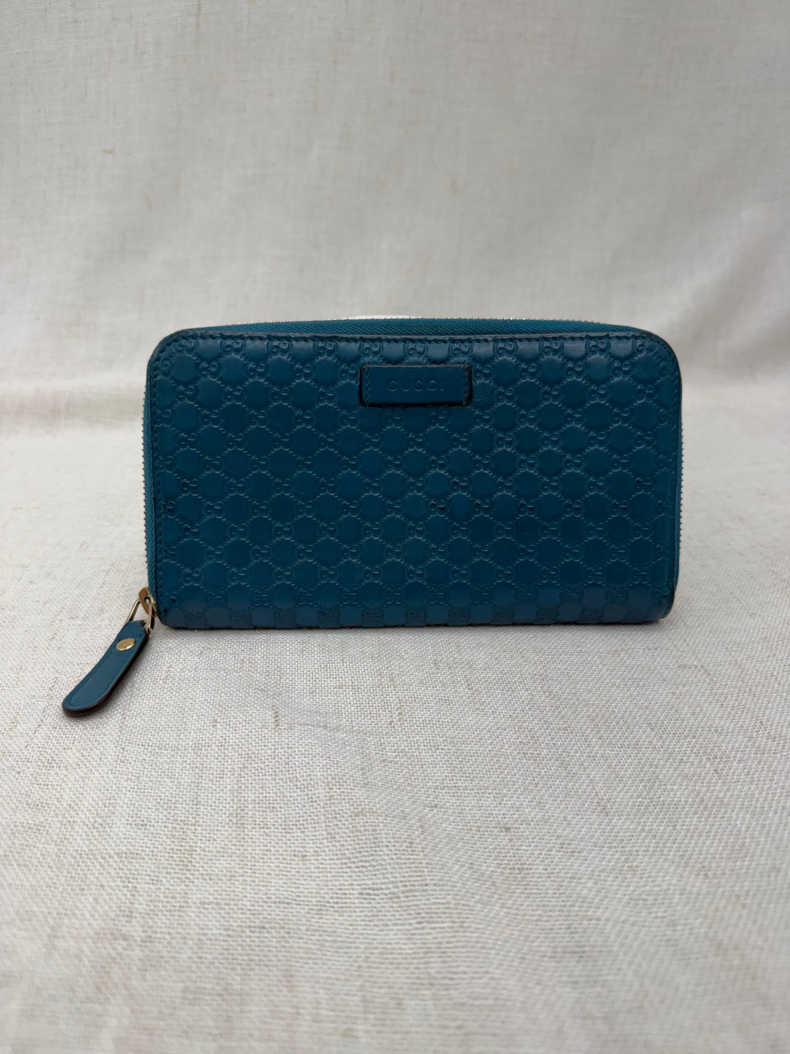 Gucci Teal Guccissima Leather Zippy Leather