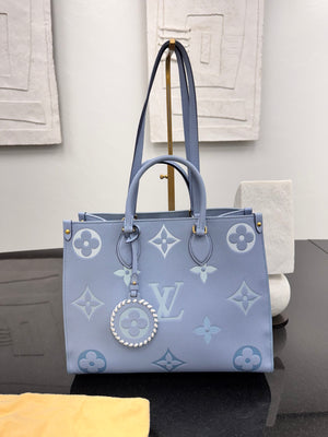 LIKE NEW - Louis Vuitton Blue Empreinte Monogram Giant By The Pool On The Go Tote Bag MM