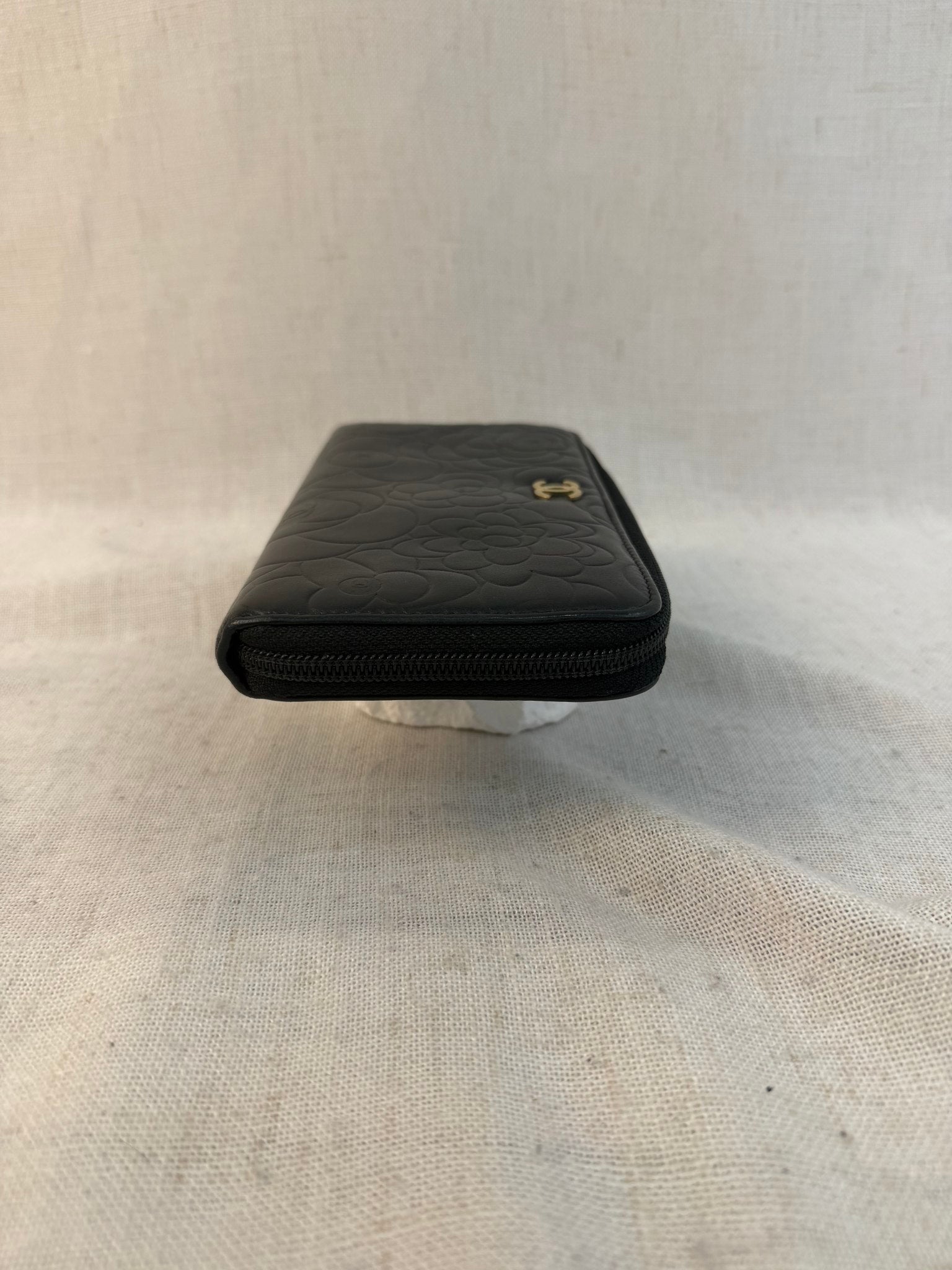 Chanel Black Lambskin Camellia Embossed Zippy Wallet