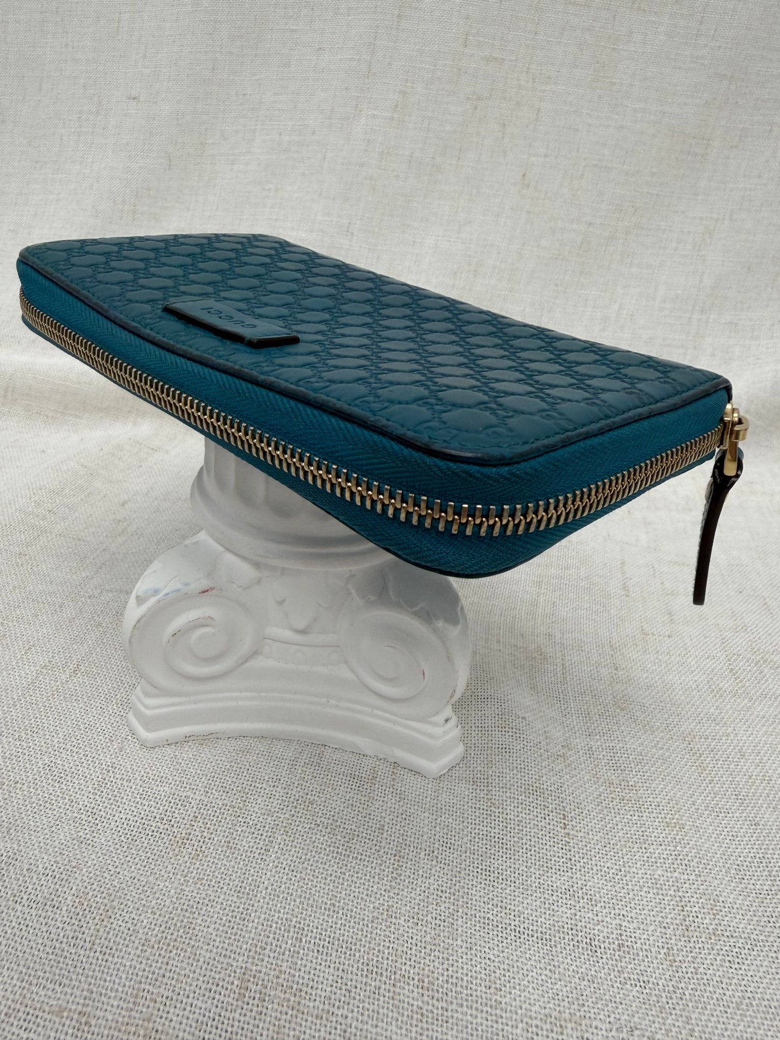 Gucci Teal Guccissima Leather Zippy Leather