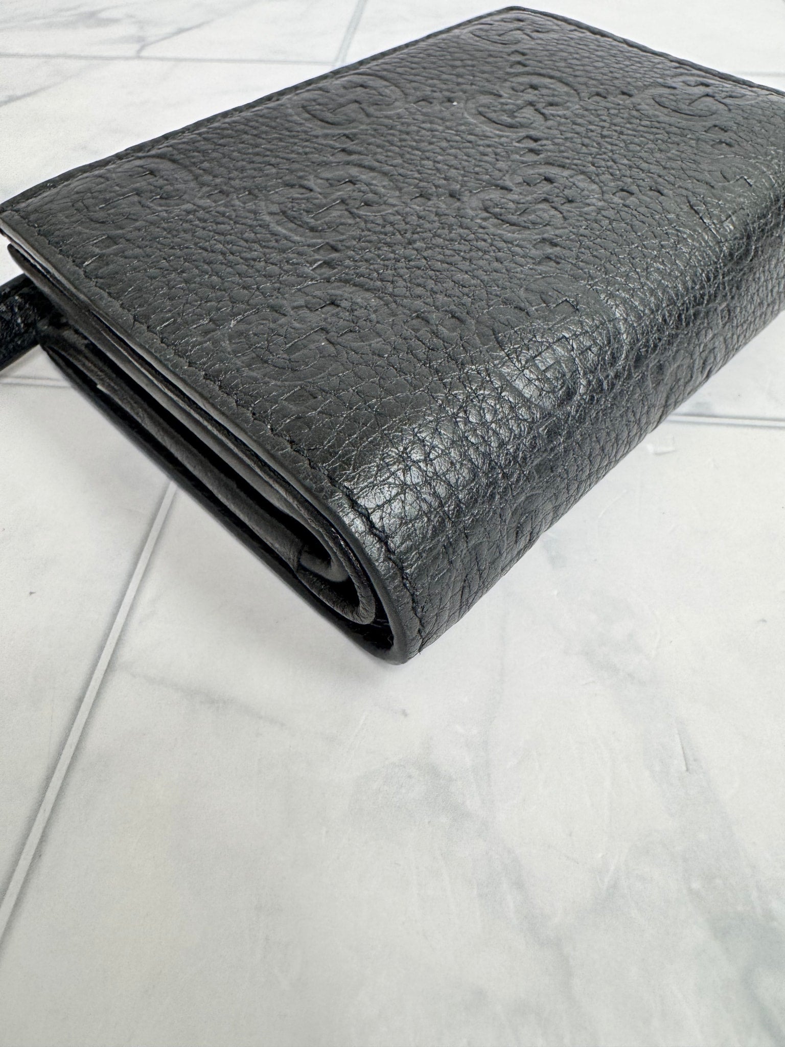 Gucci Black GG Embossed Leather Compact Wallet