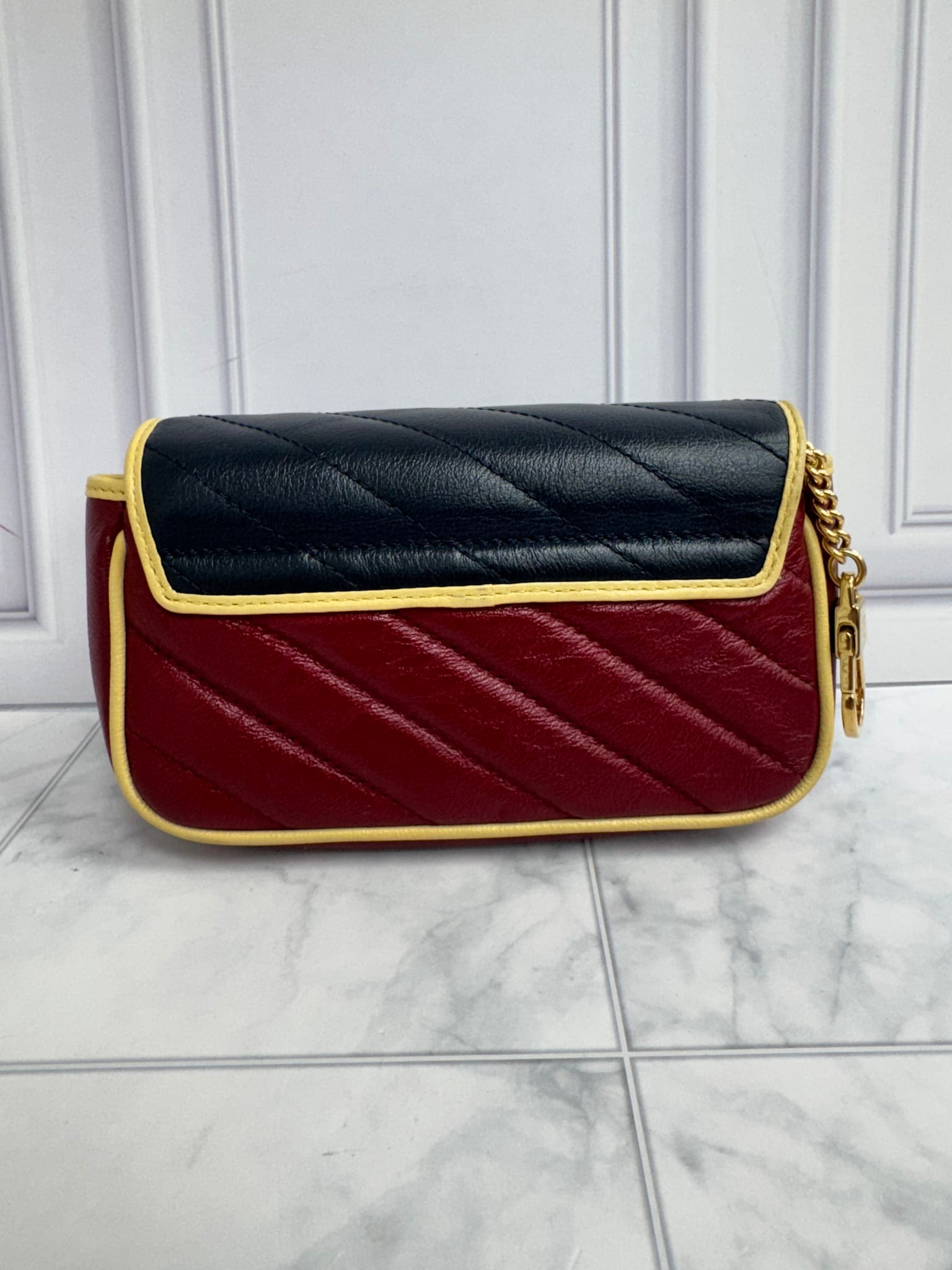 Gucci Red And Navy Quilted GG Marmont Torchon Super Mini Crossbody Bag