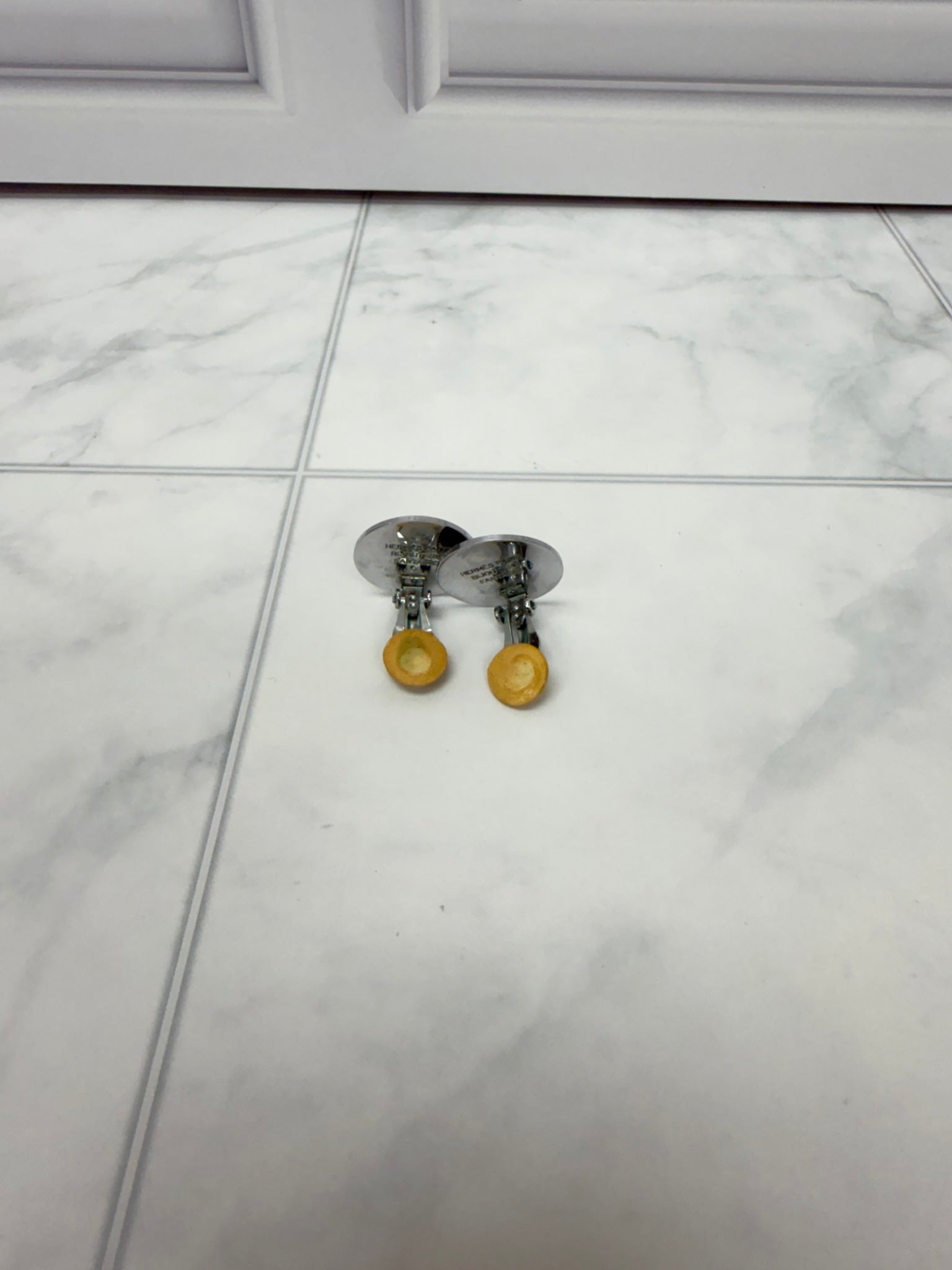 Hermes Silver Tone Coin Clip On Earrings 