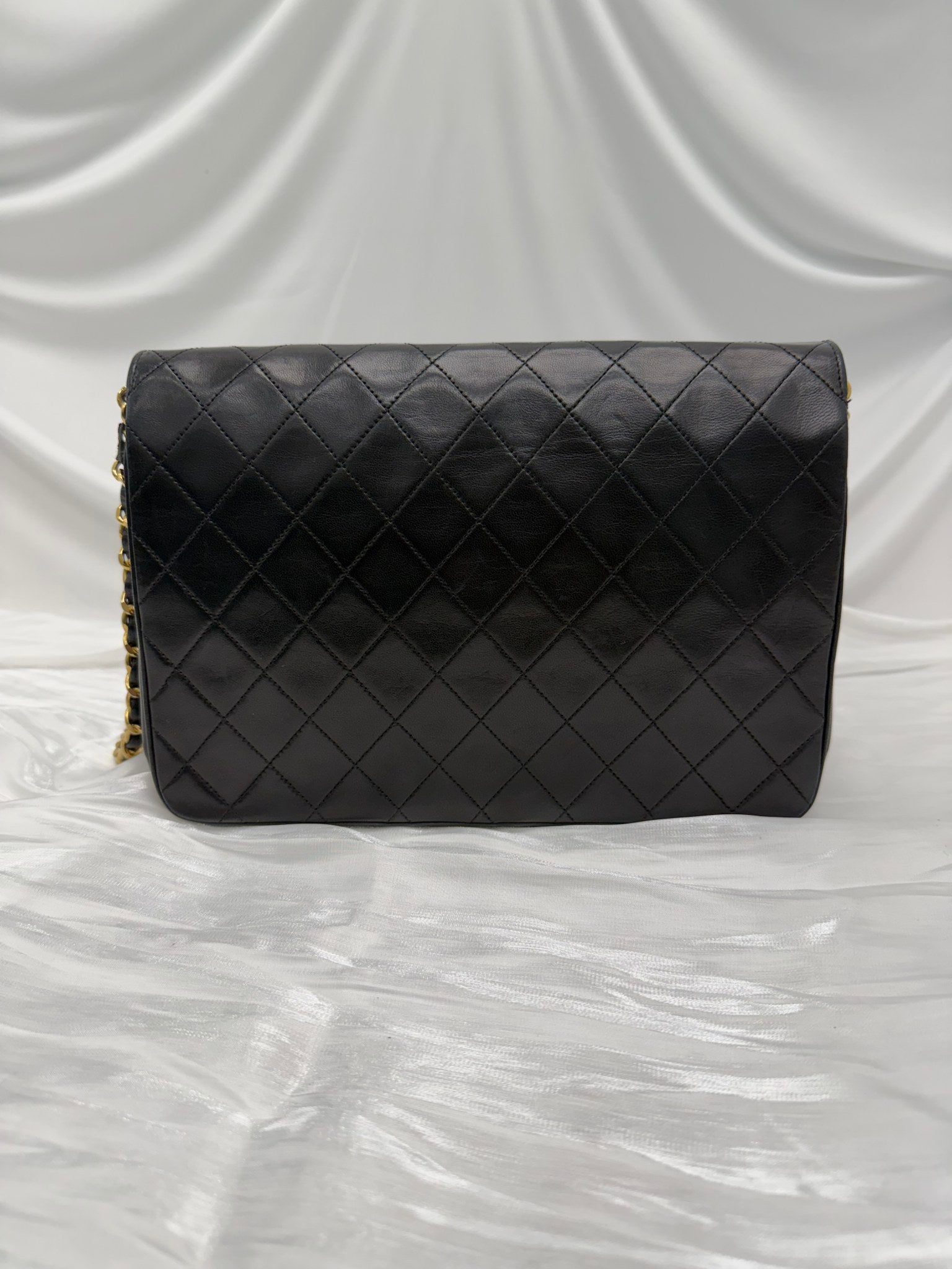 Chanel Vintage Black Quilted Leather 24K Flap Bag
