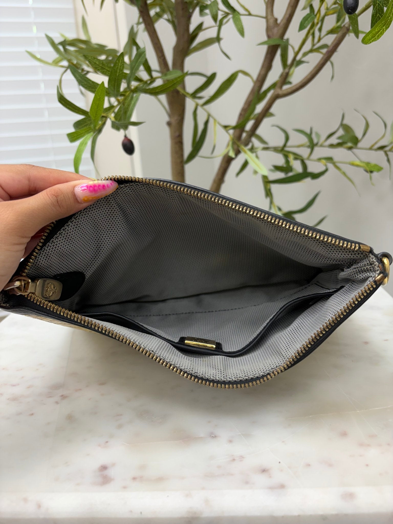 MCM Yellow Python Embossed Clutch