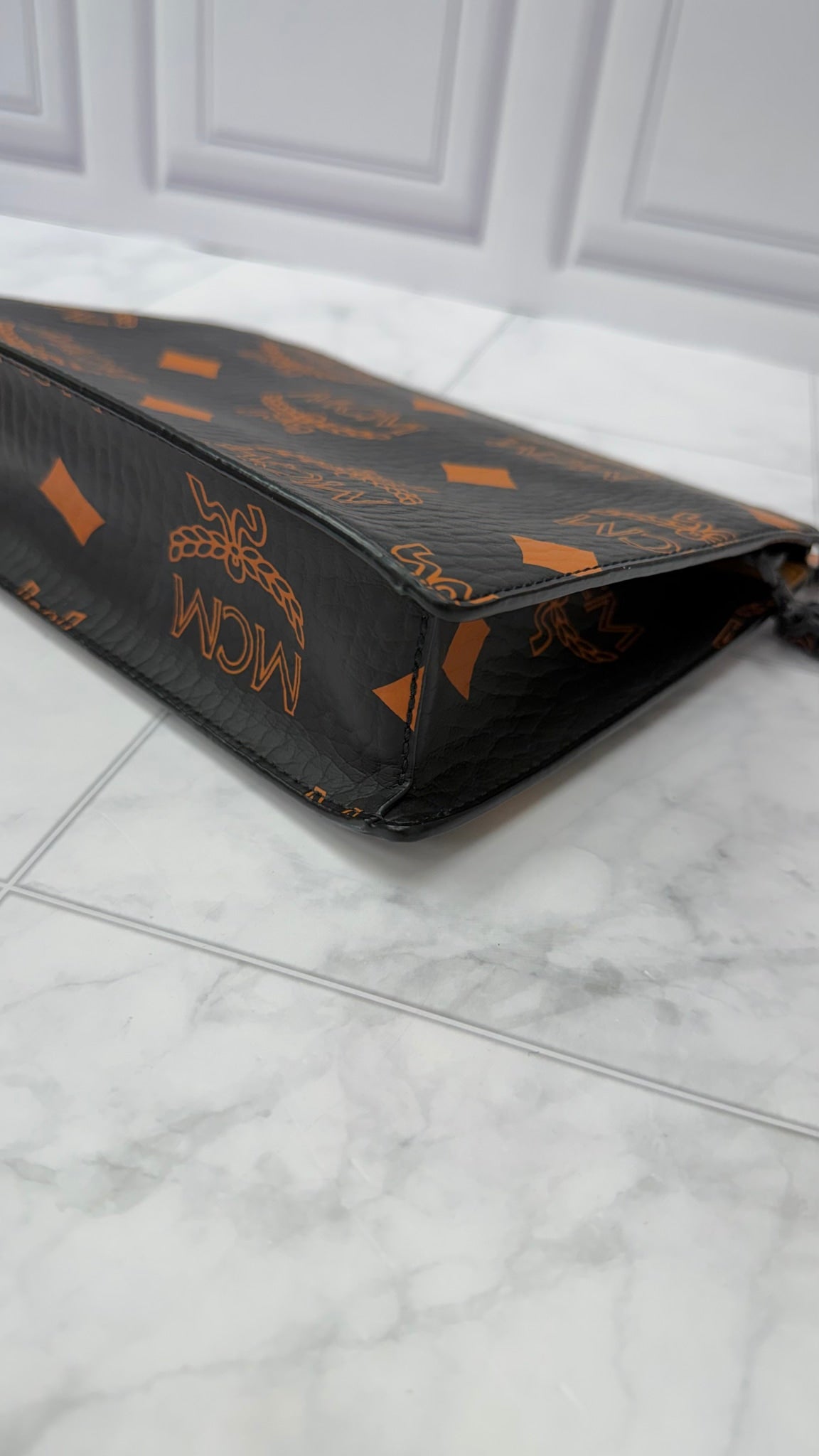 MCM Black & Orange Coated Canvas Pouch