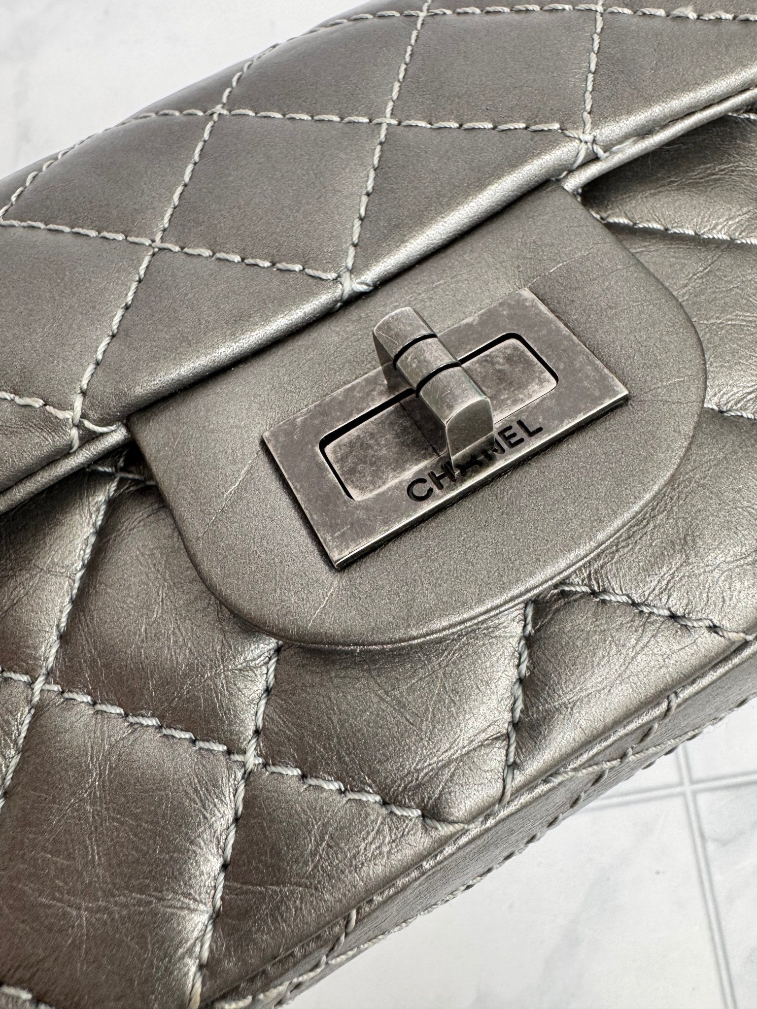 Chanel Metallic Silver Quilted Leather Reissue 2.55 Mini Flap Chain Bag
