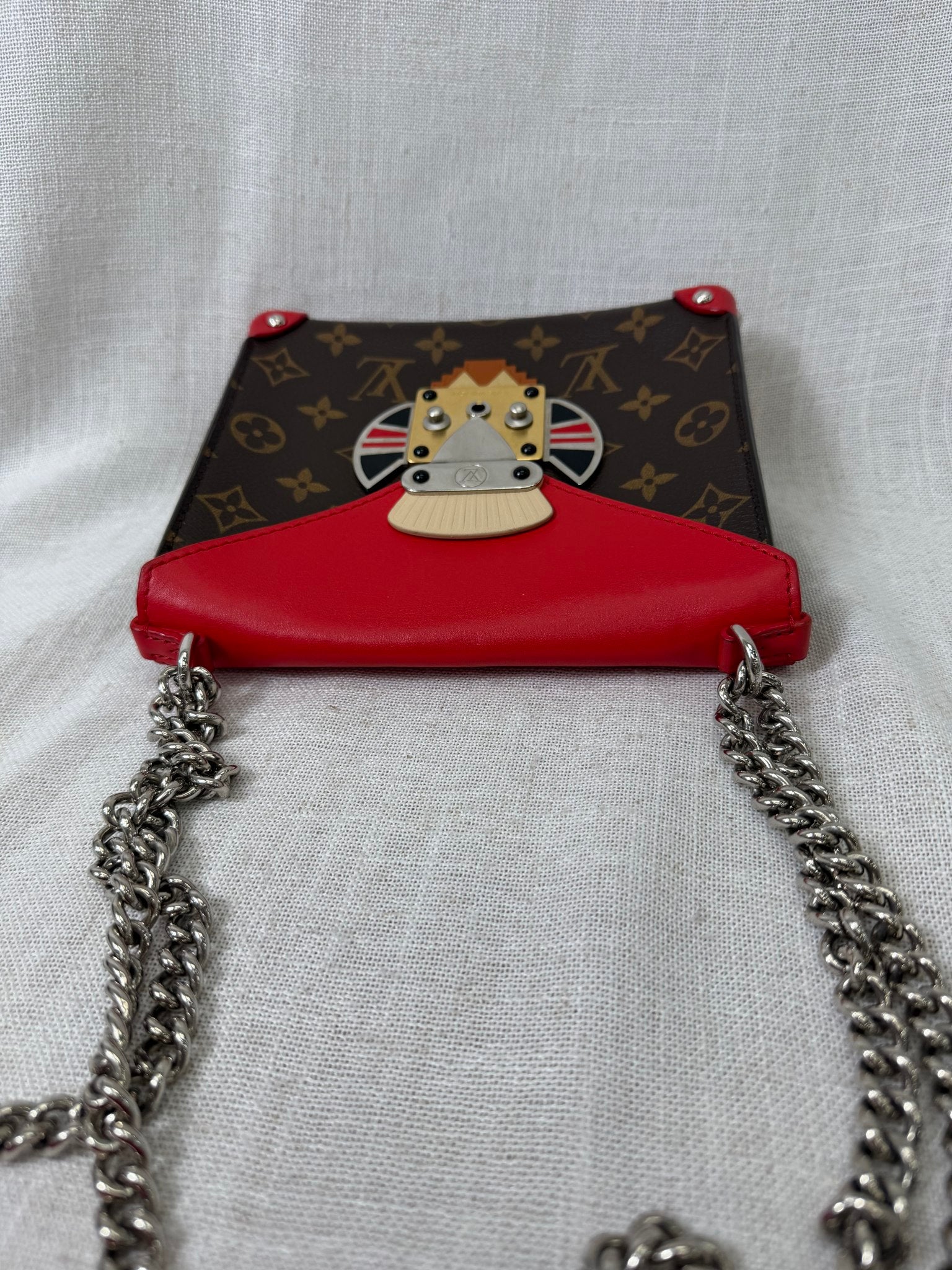 Louis Vuitton Rouge Limited Edition Tribal Mask Pochette Crossbody