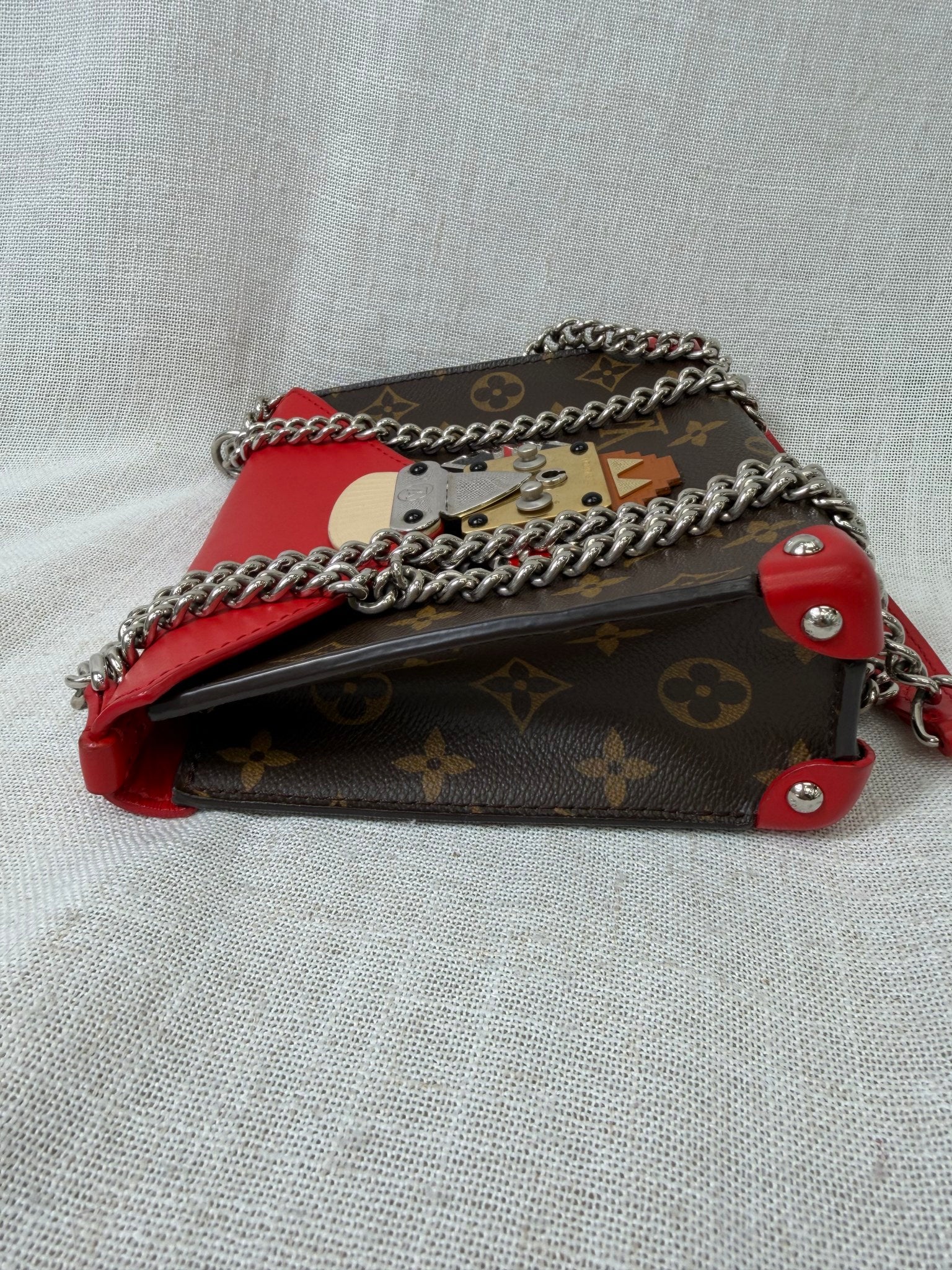Louis Vuitton Rouge Limited Edition Tribal Mask Pochette Crossbody