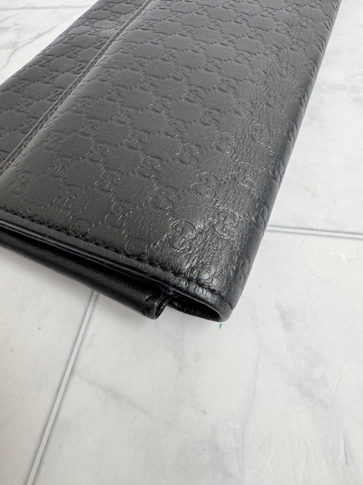 Gucci Black Microguccissima Embossed Leather Wristlet