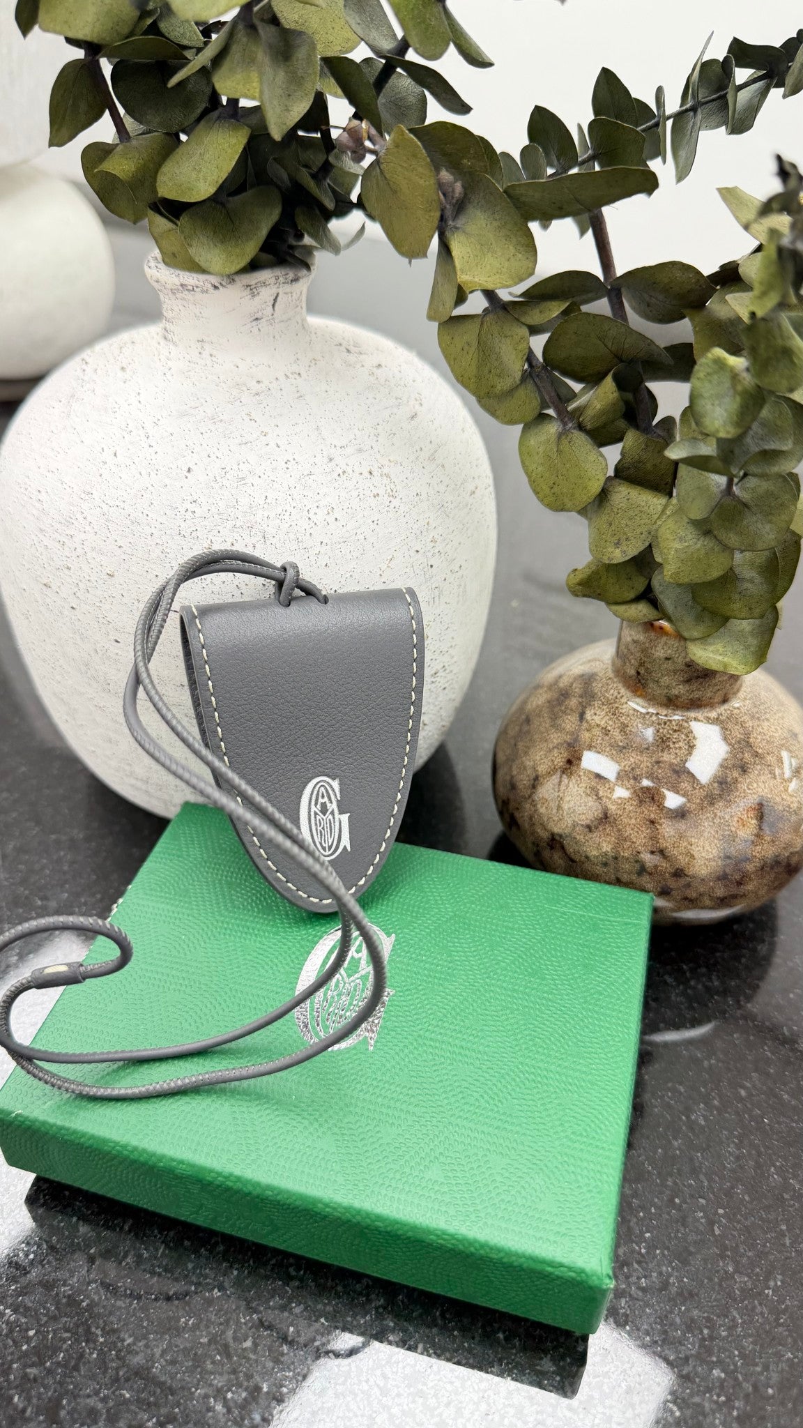 BRAND NEW - Goyard Grey Leather Bag Clip 