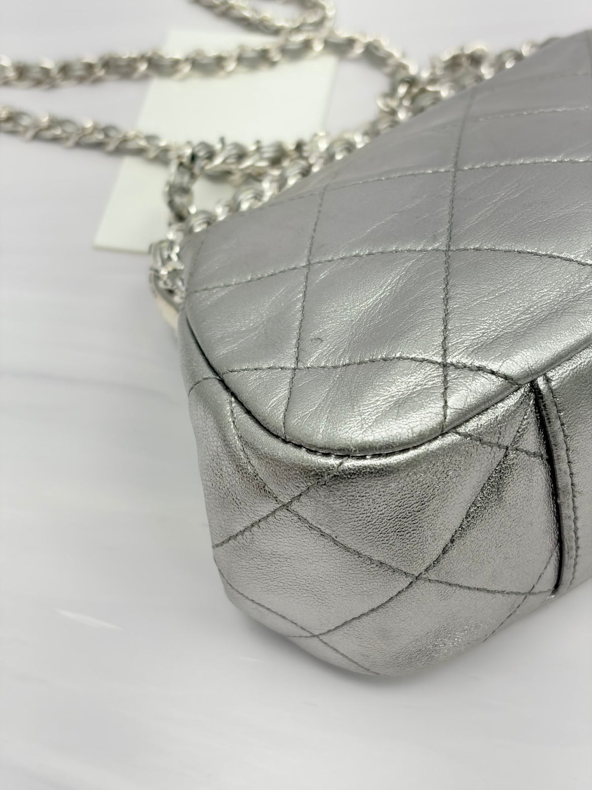 Chanel Metallic Silver Quilted Lambskin Kisslock Frame Bag