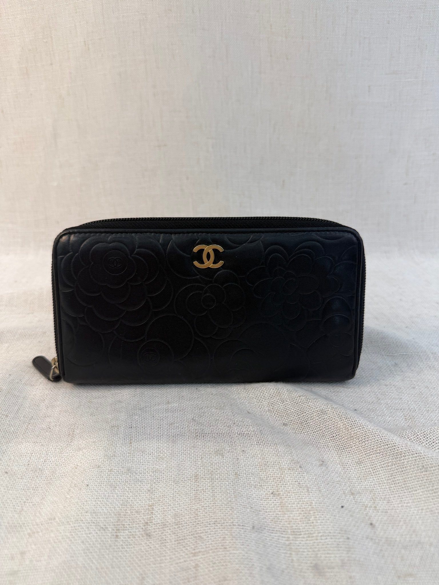 Chanel Black Lambskin Camellia Embossed Zippy Wallet