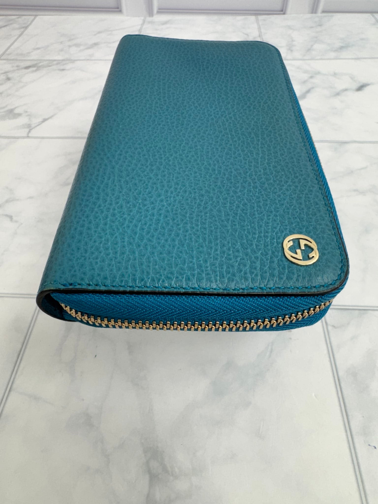 Gucci Teal Grained Leather Zippy Wallet