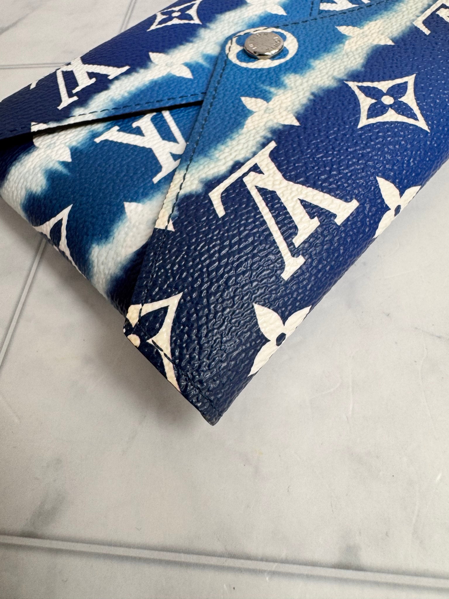 Louis Vuitton Blue Monogram Escale Medium Kirigami Pochette