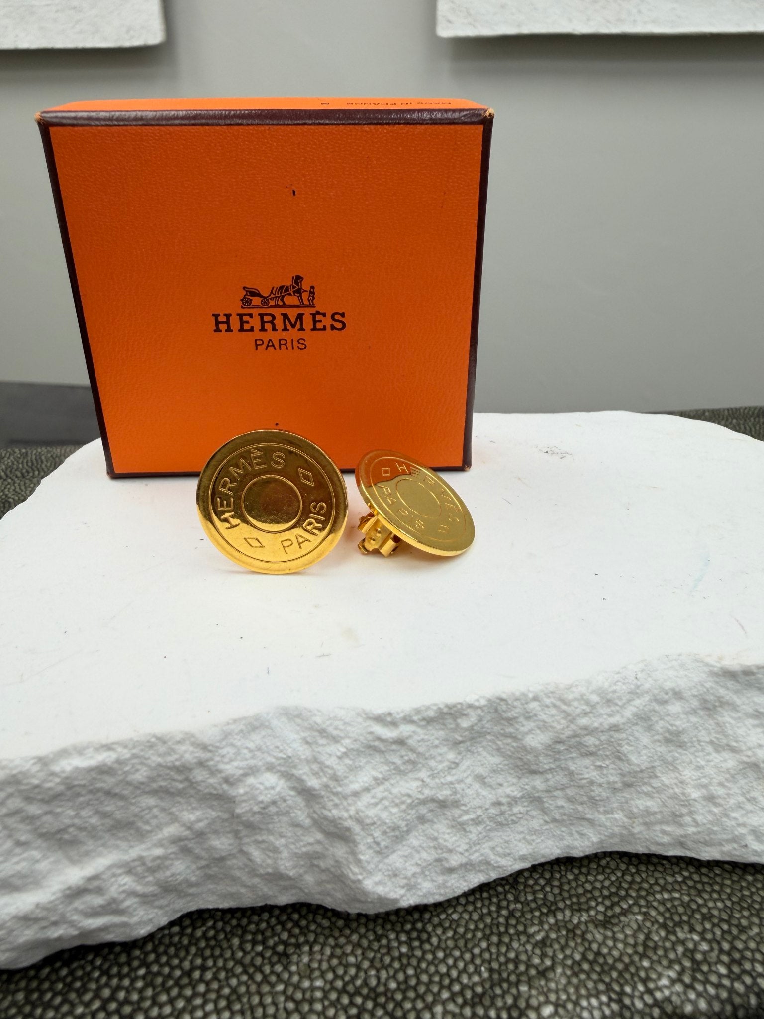 Hermes Gold Tone Coin Clip On Earrings