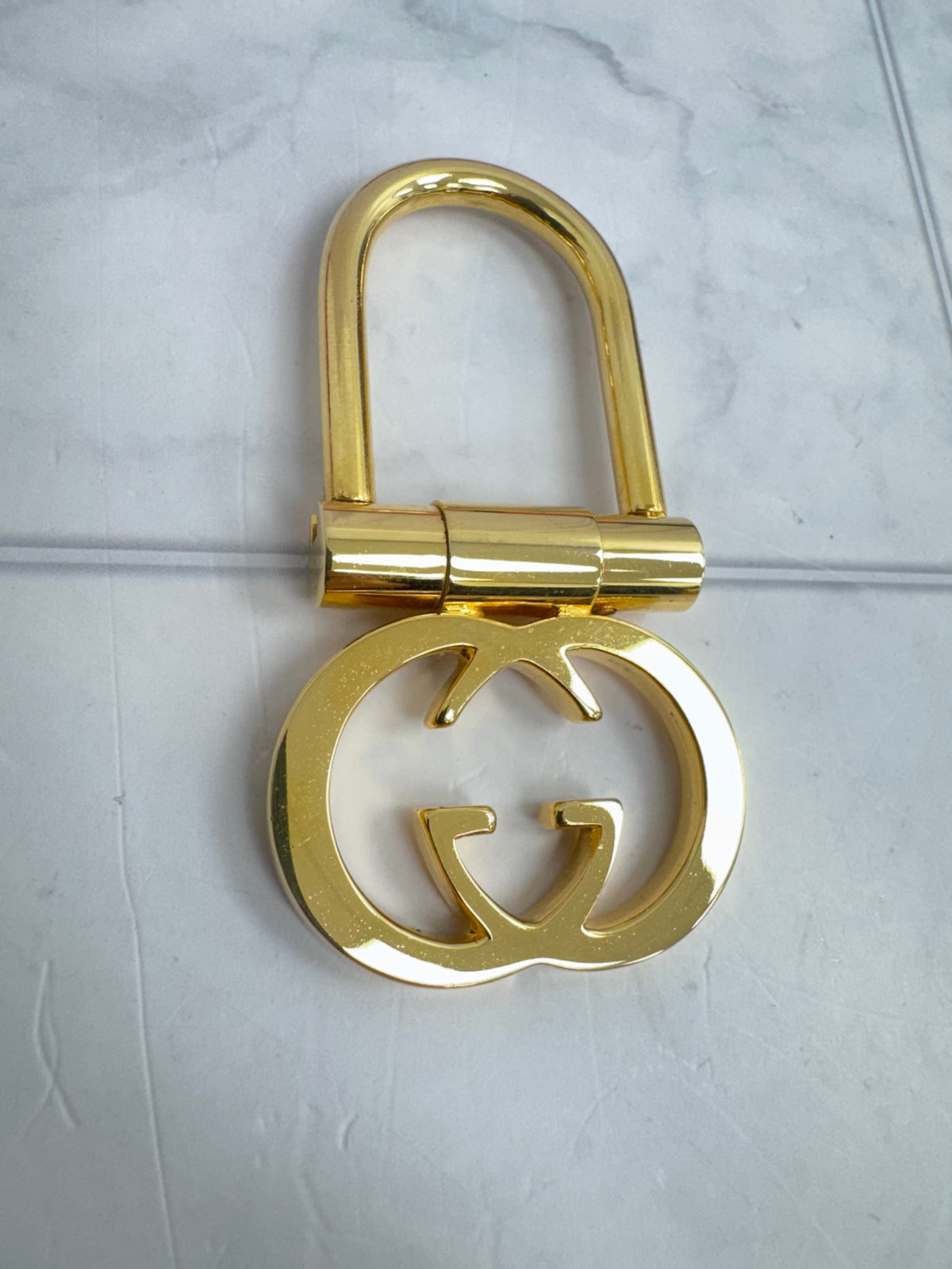 Gucci Gold Tone Interlocking G Keychain 