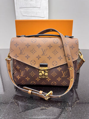 Louis Vuitton Reverse Monogram Pochette Metise