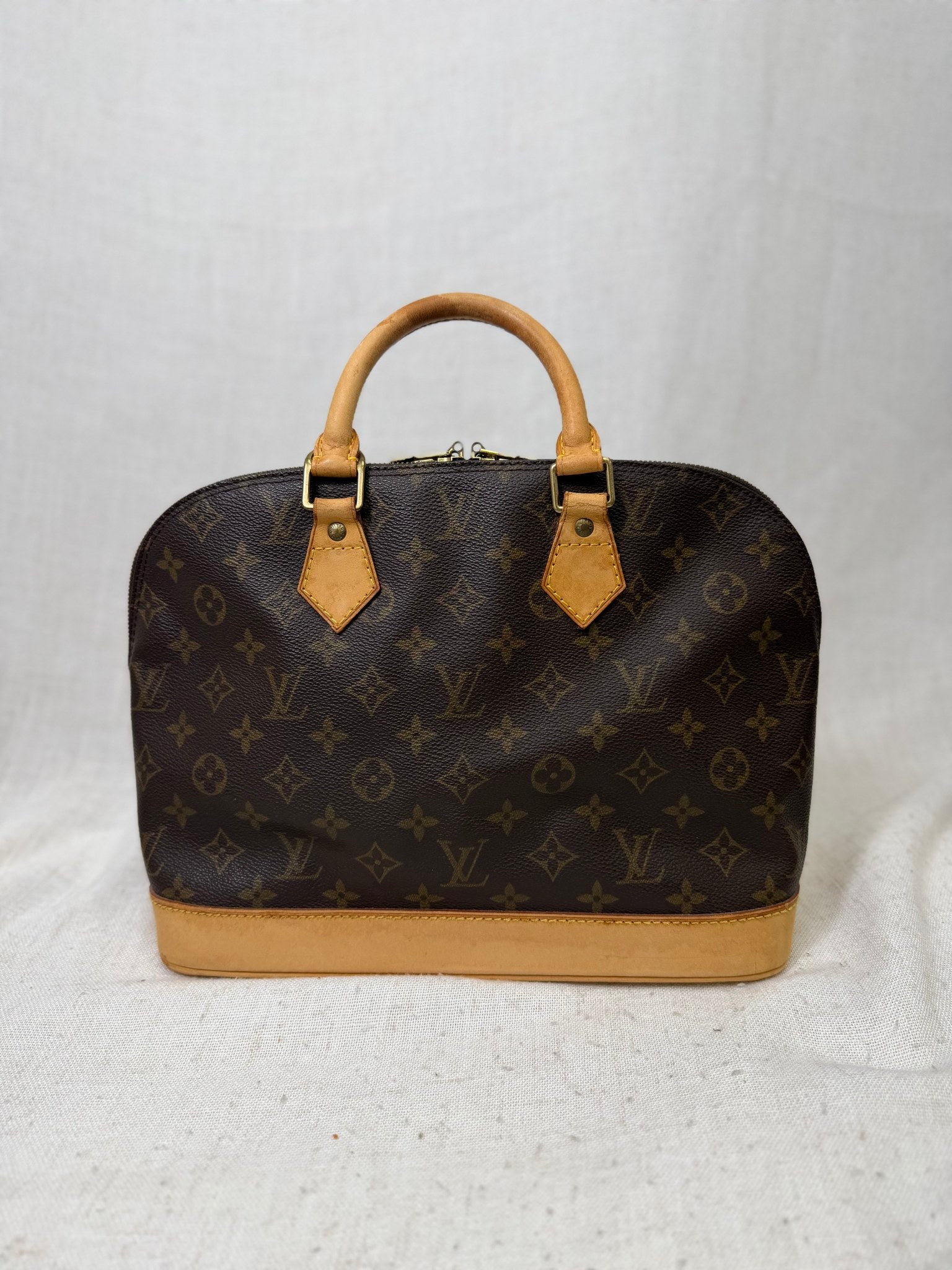 Louis Vuitton Monogram Alma PM Handbag